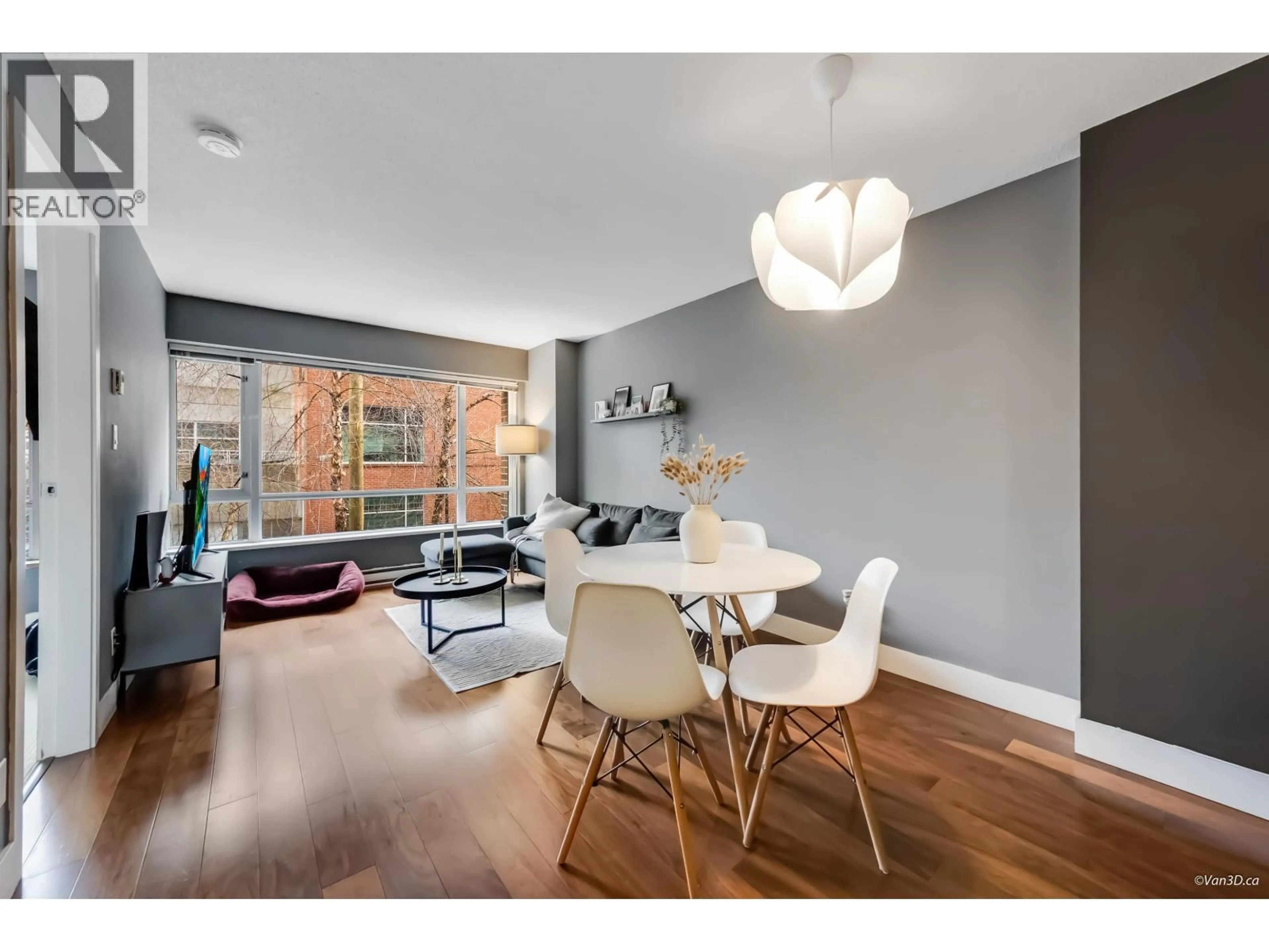 Living room with furniture, wood/laminate floor for 213 - 1088 RICHARDS STREET, Vancouver British Columbia V6B0J8