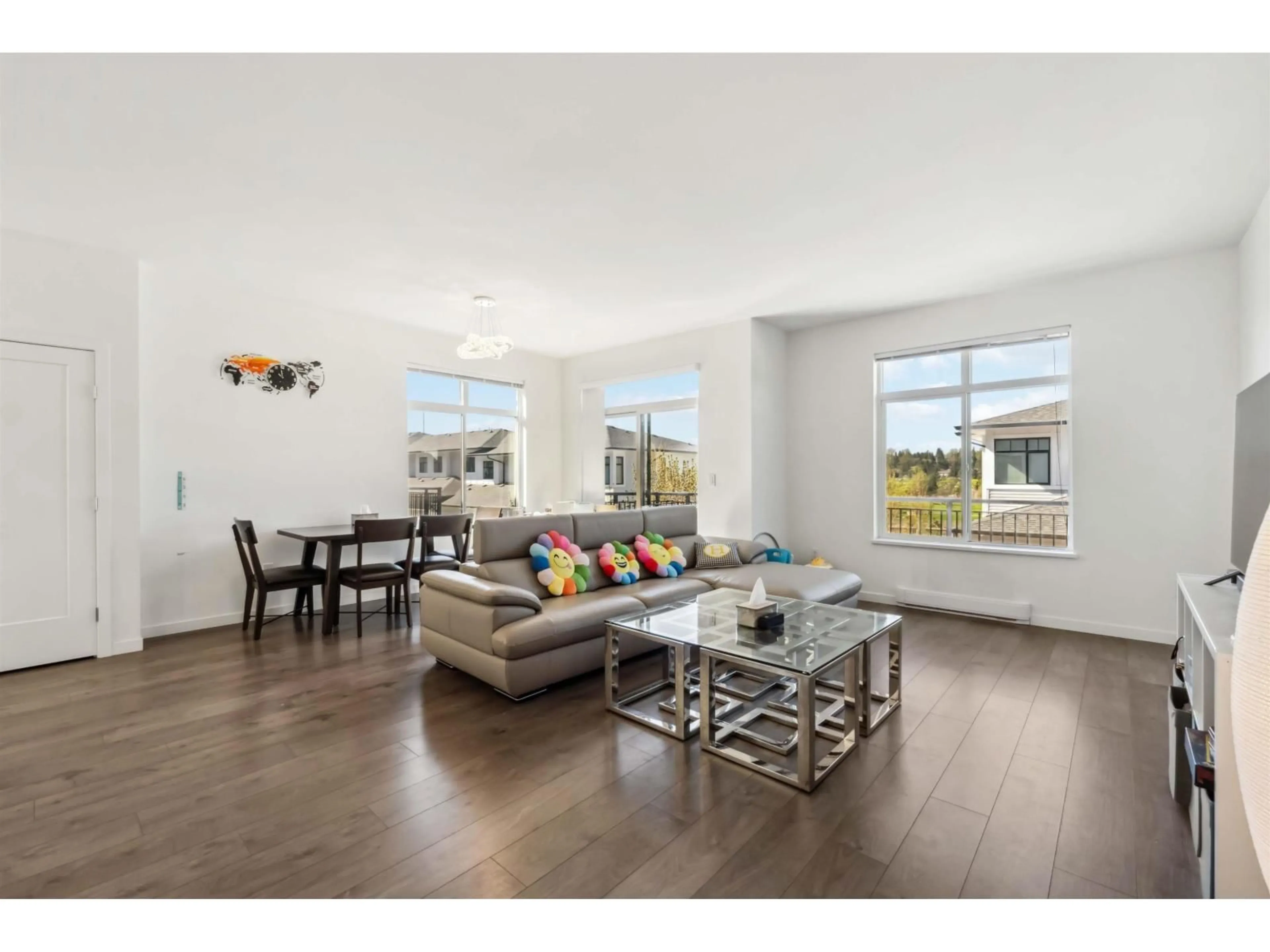 Living room with furniture, wood/laminate floor for 58 - 15255 SITKA DRIVE, Surrey British Columbia V3S0B1
