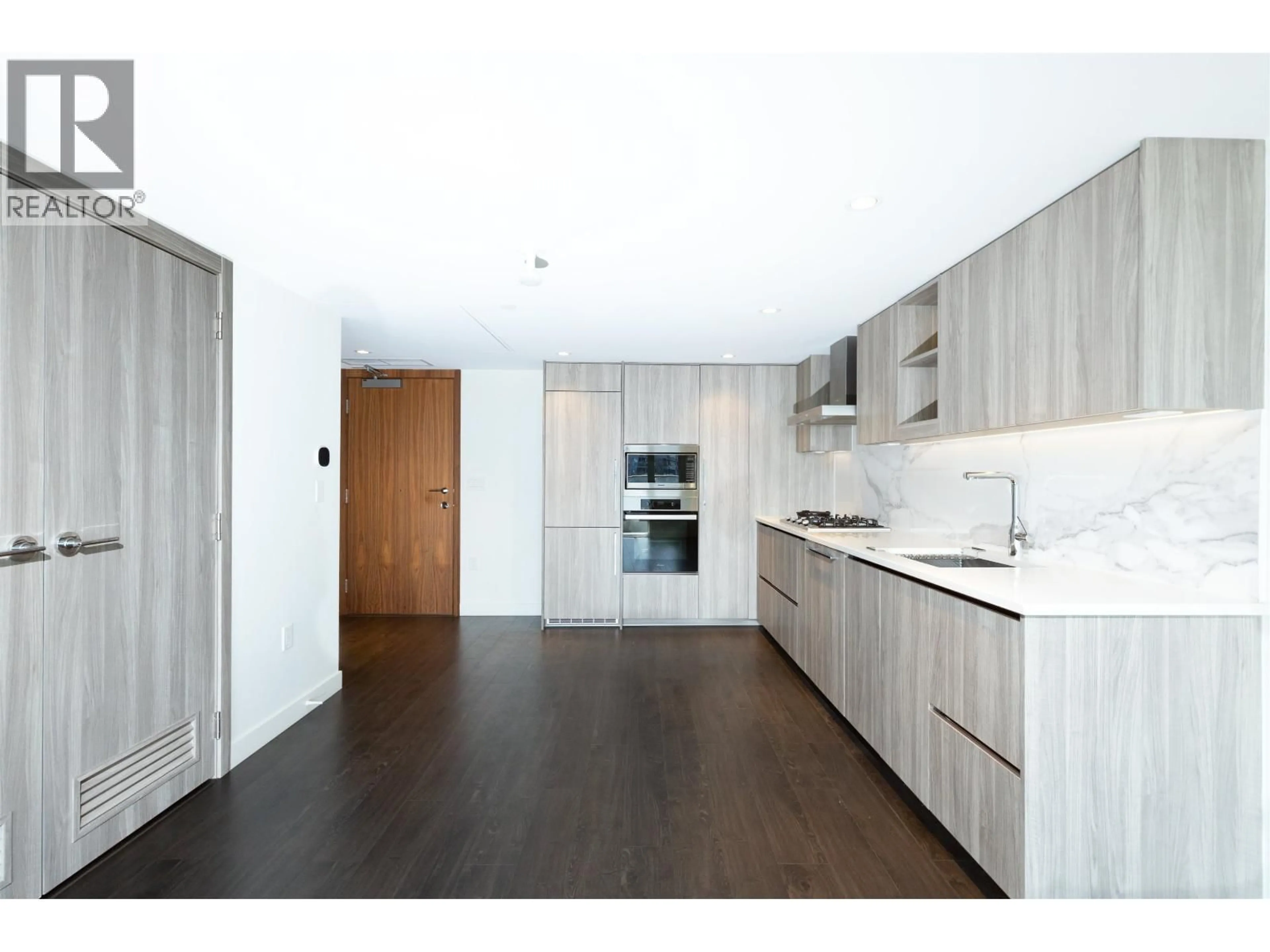 Open concept kitchen, wood/laminate floor for 605 - 8555 CAPSTAN WAY, Richmond British Columbia V6X0W1