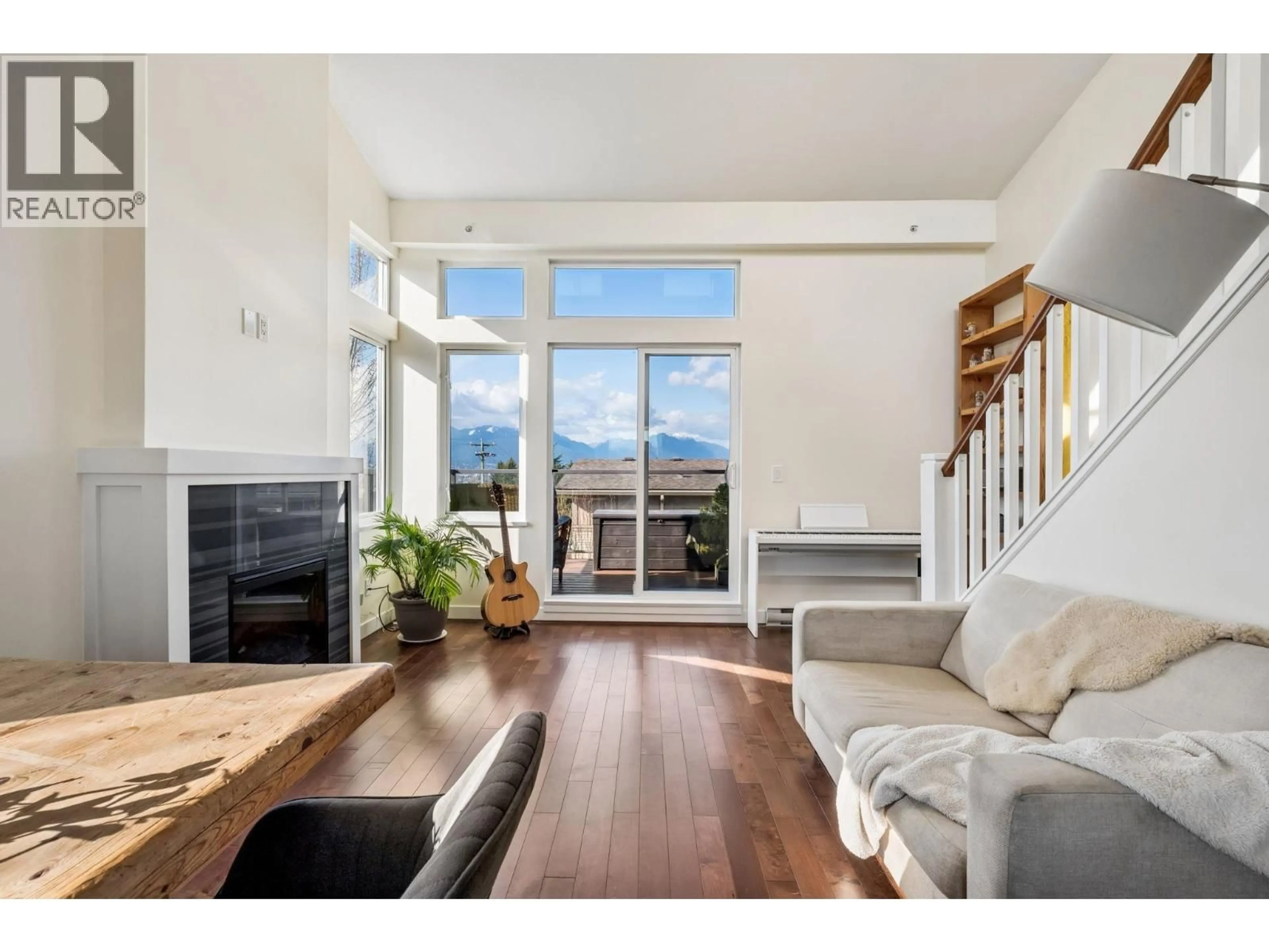 Living room with furniture, wood/laminate floor for 18 - 3788 LAUREL STREET, Burnaby British Columbia V5G1M7