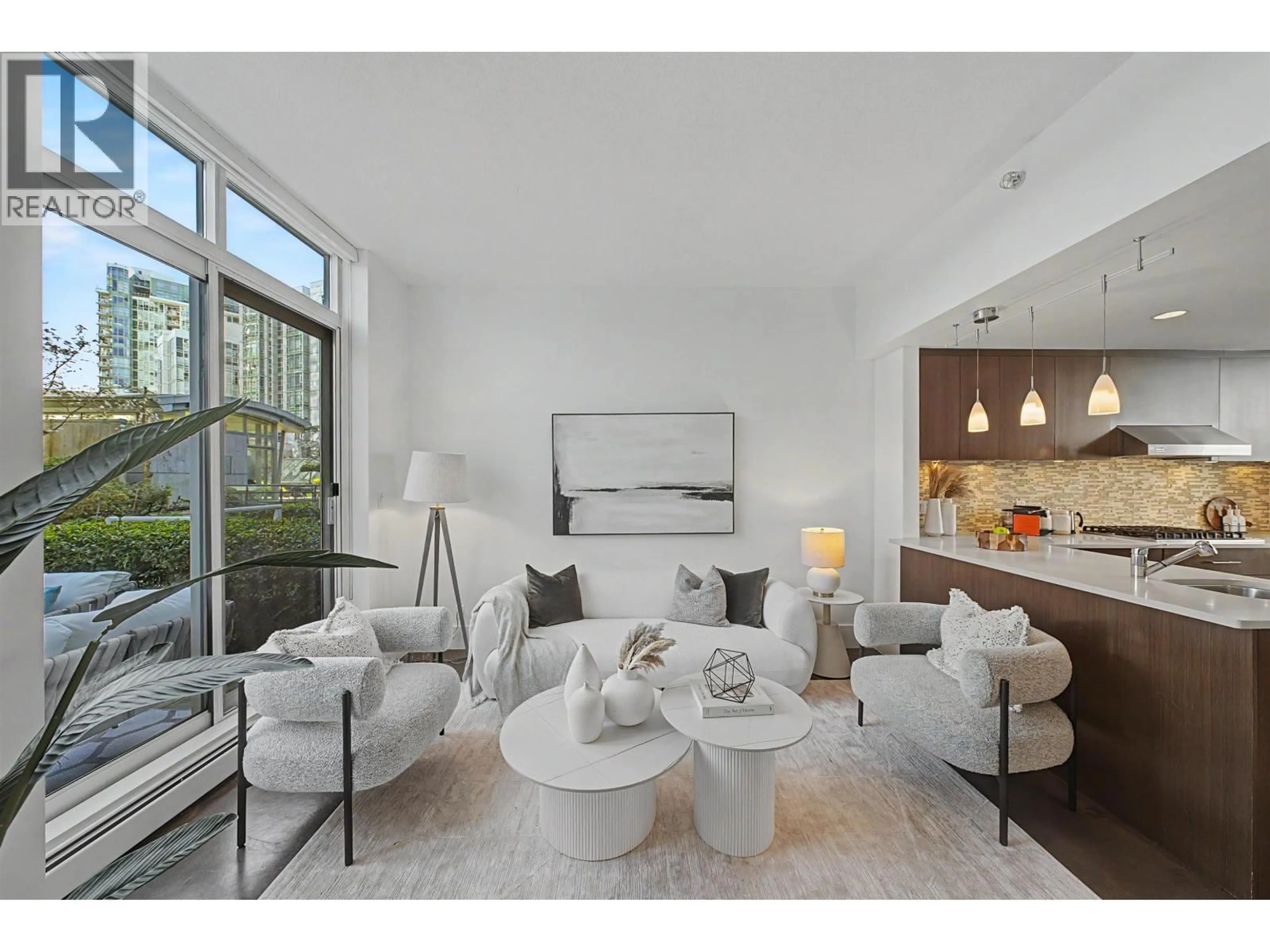 Living room with furniture, unknown for TH A - 1199 MARINASIDE CRESCENT, Vancouver British Columbia V6Z2Y2