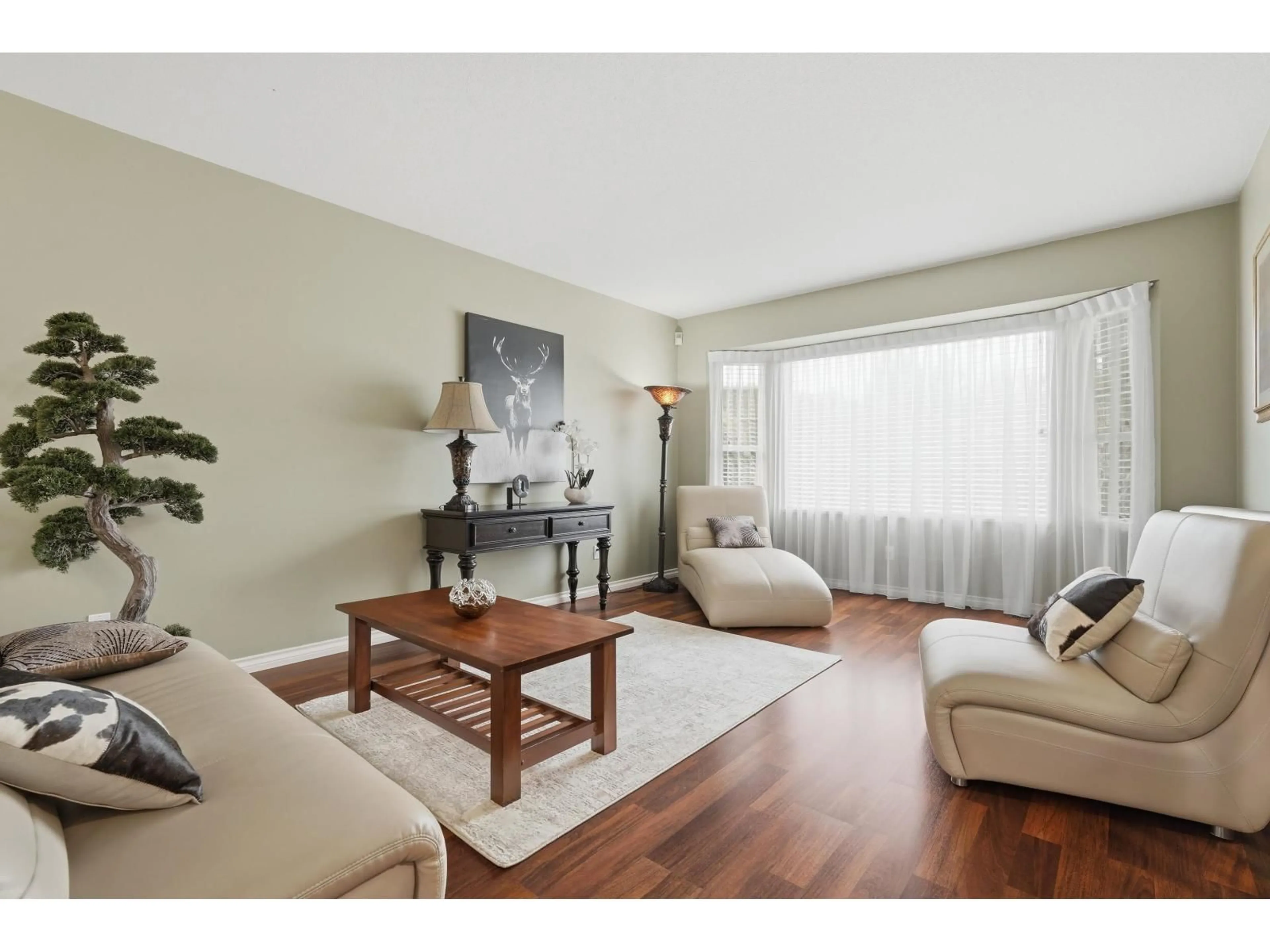 Living room with furniture, wood/laminate floor for 12316 SOUTHPARK CRESCENT, Surrey British Columbia V3X2C1