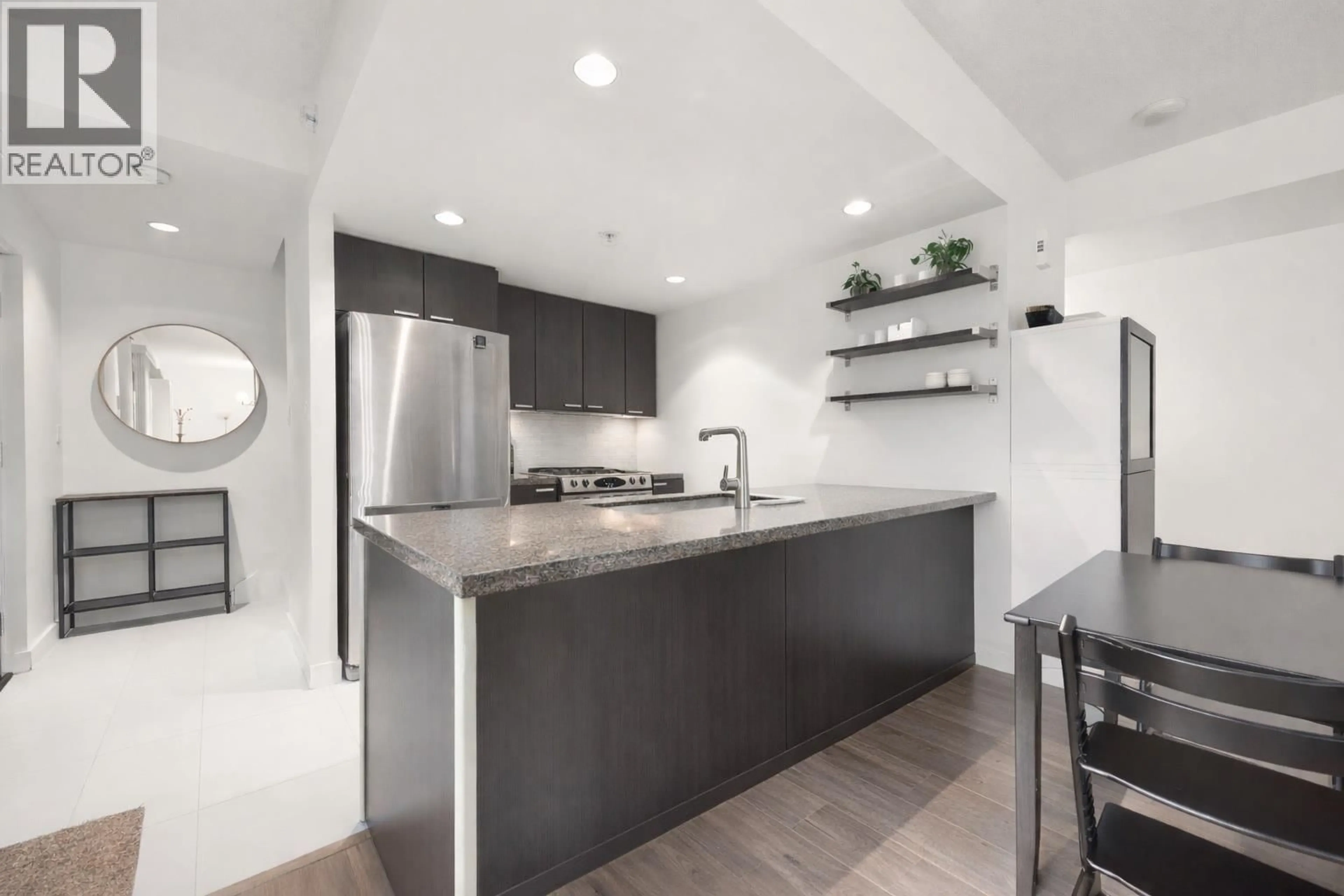 Open concept kitchen, unknown for 103 - 2232 DOUGLAS ROAD, Burnaby British Columbia V5C0G9