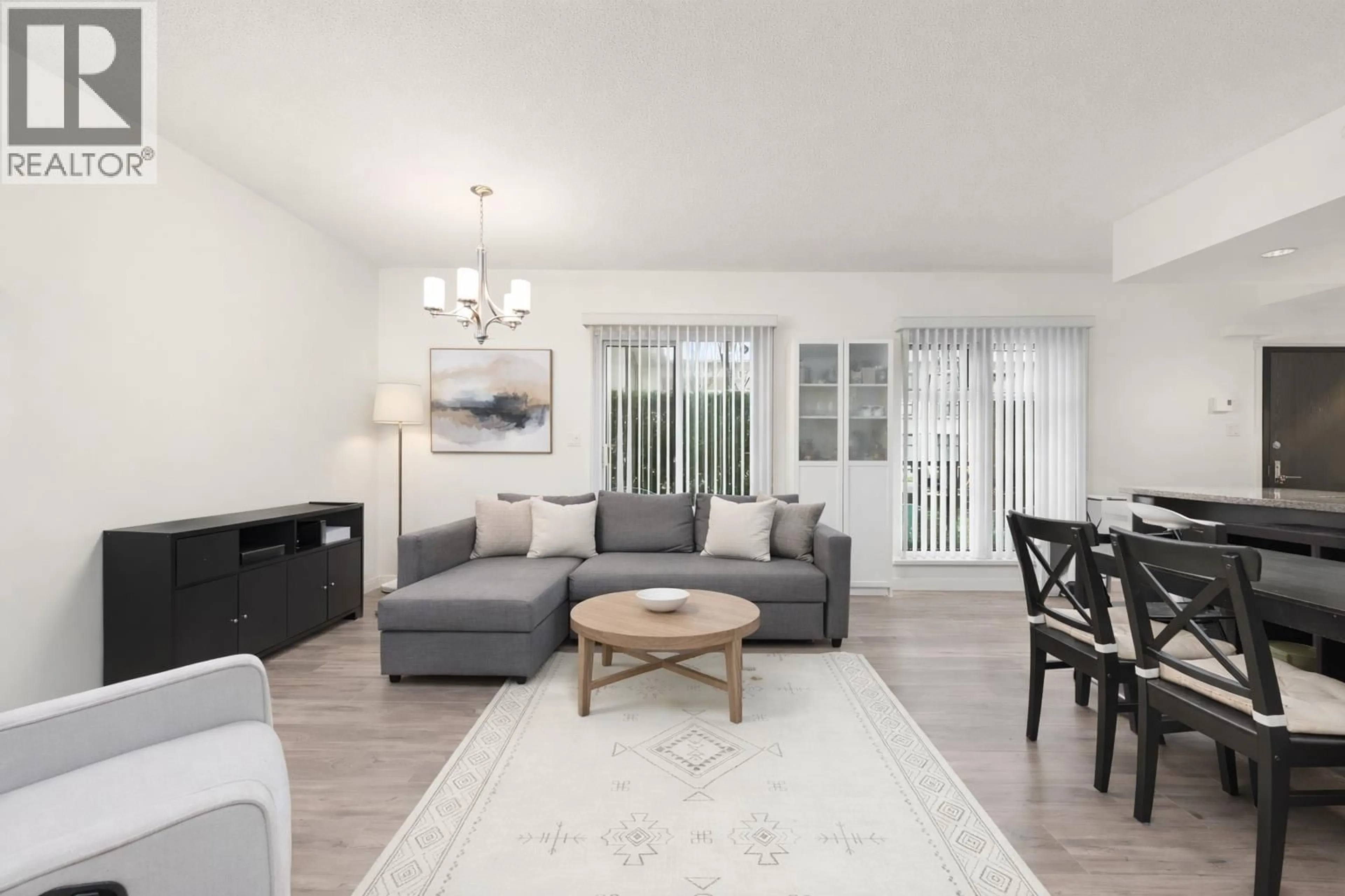 Living room with furniture, unknown for 103 - 2232 DOUGLAS ROAD, Burnaby British Columbia V5C0G9