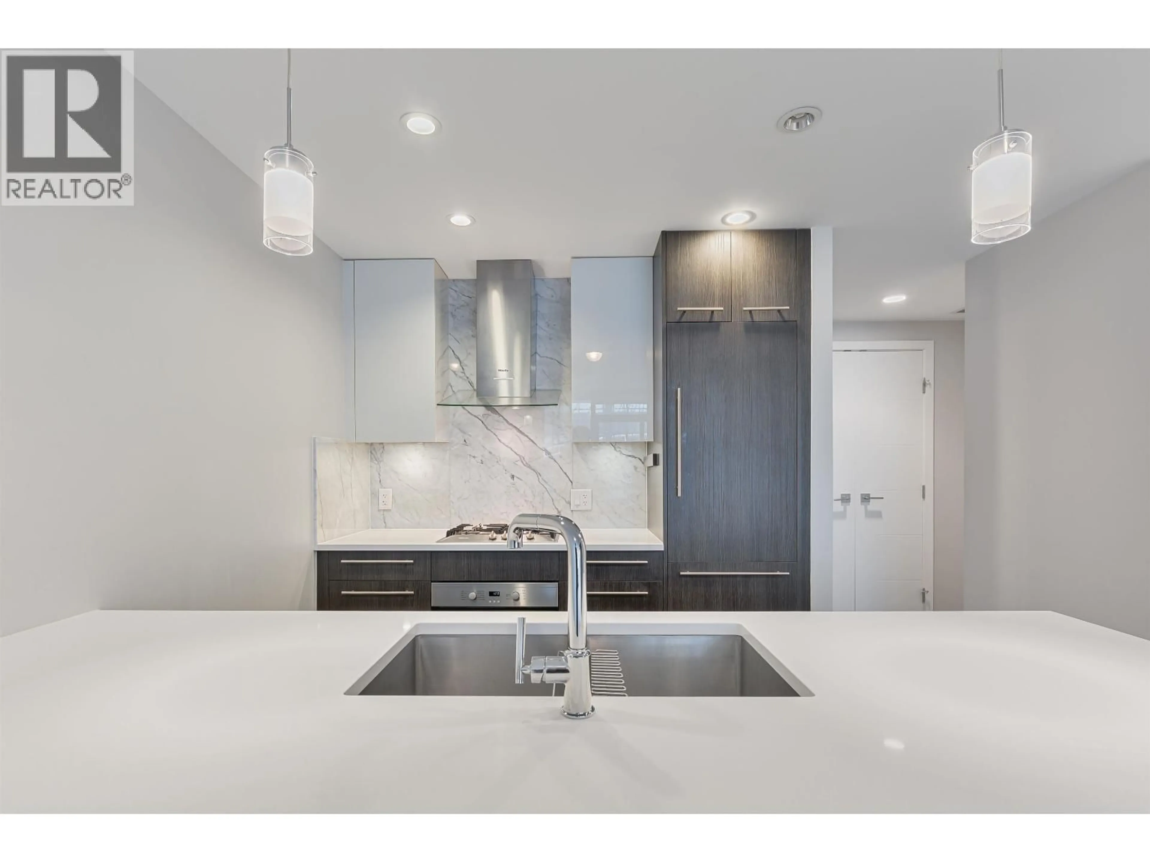 Open concept kitchen, ceramic/tile floor for 202 - 655 41ST AVENUE, Vancouver British Columbia V5Z2N1