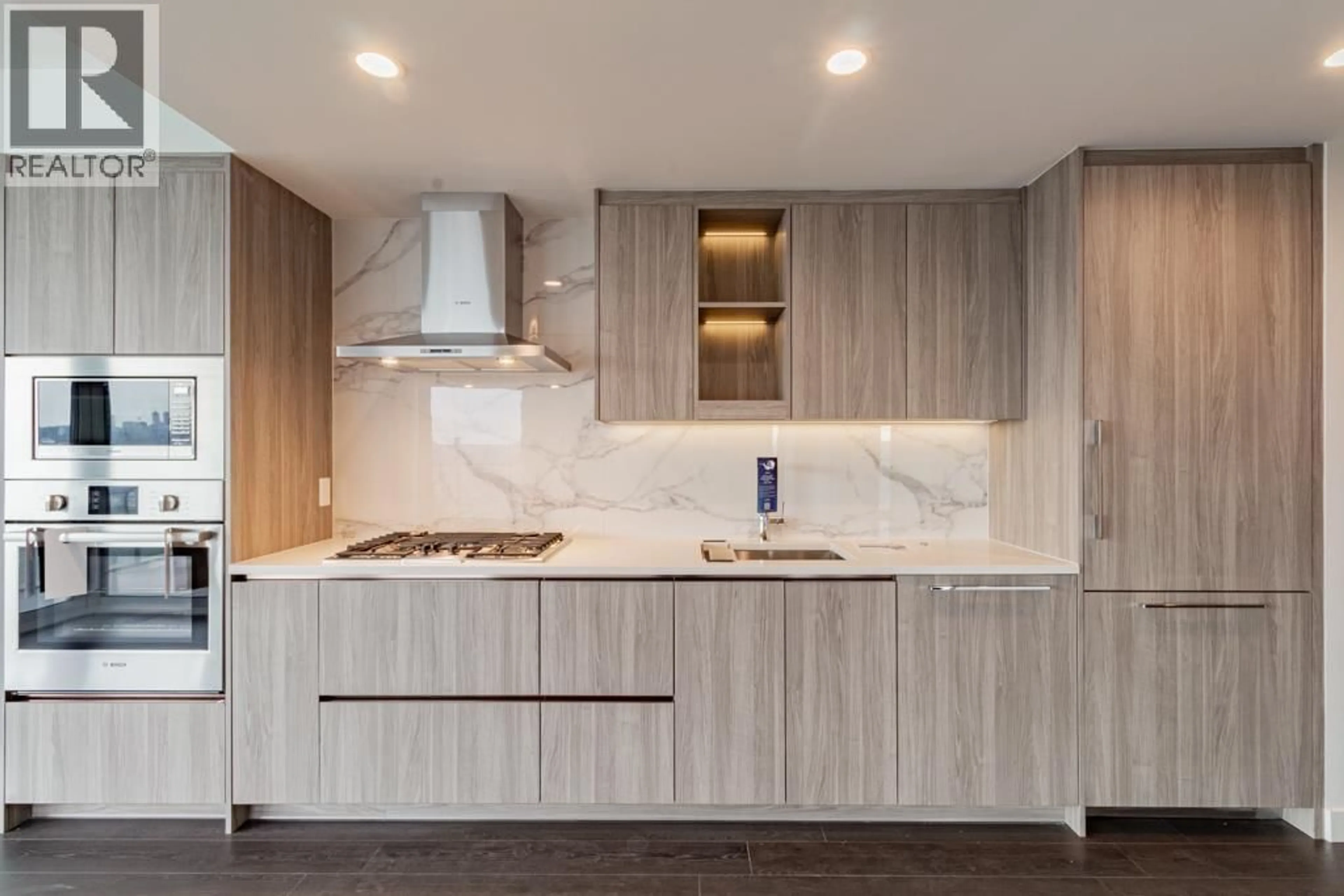 Contemporary kitchen, wood/laminate floor for 2409 - 4880 LOUGHEED HIGHWAY, Burnaby British Columbia V5C0N1