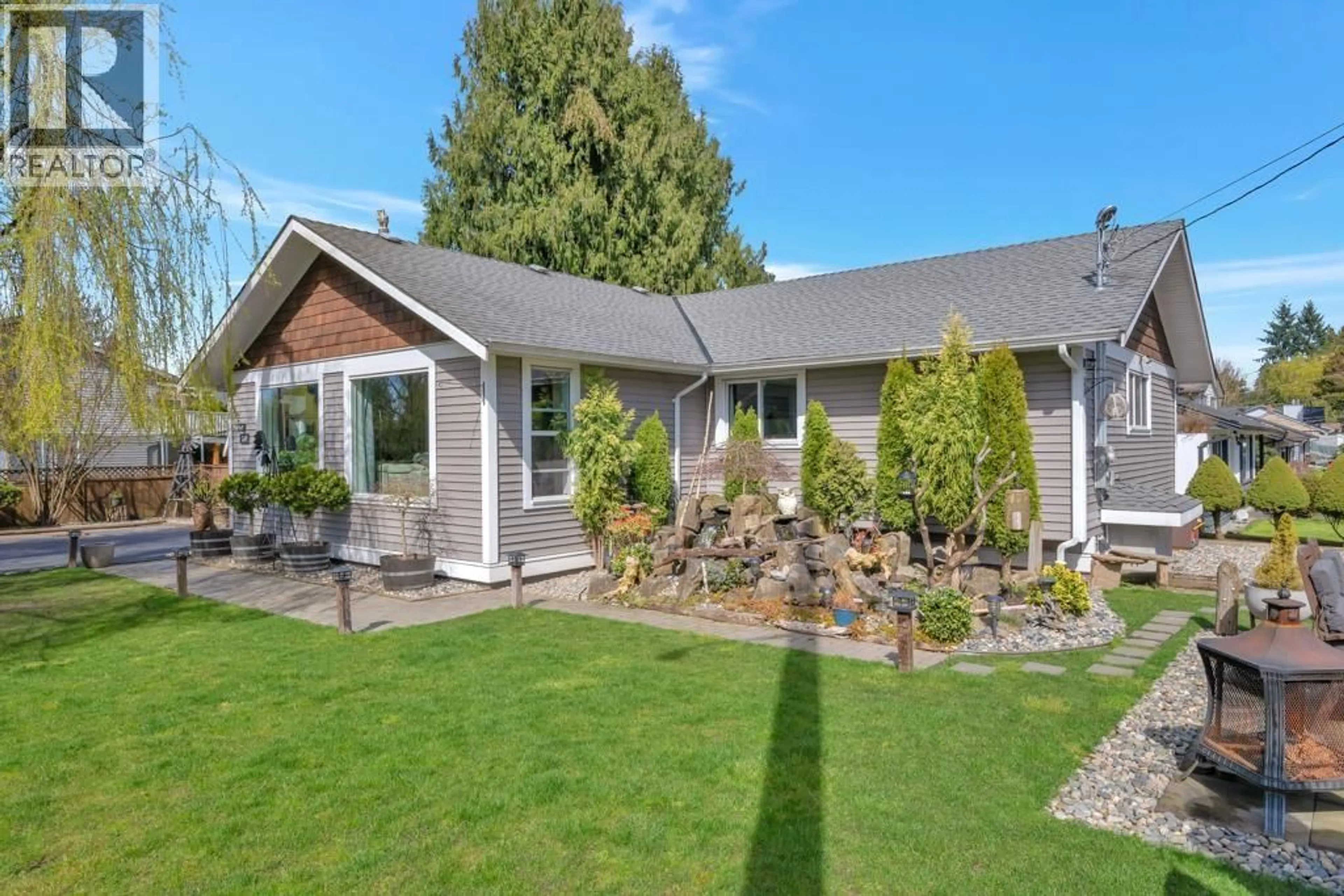 Home with vinyl exterior material, street for 21199 RIVER ROAD, Maple Ridge British Columbia V2X2A5