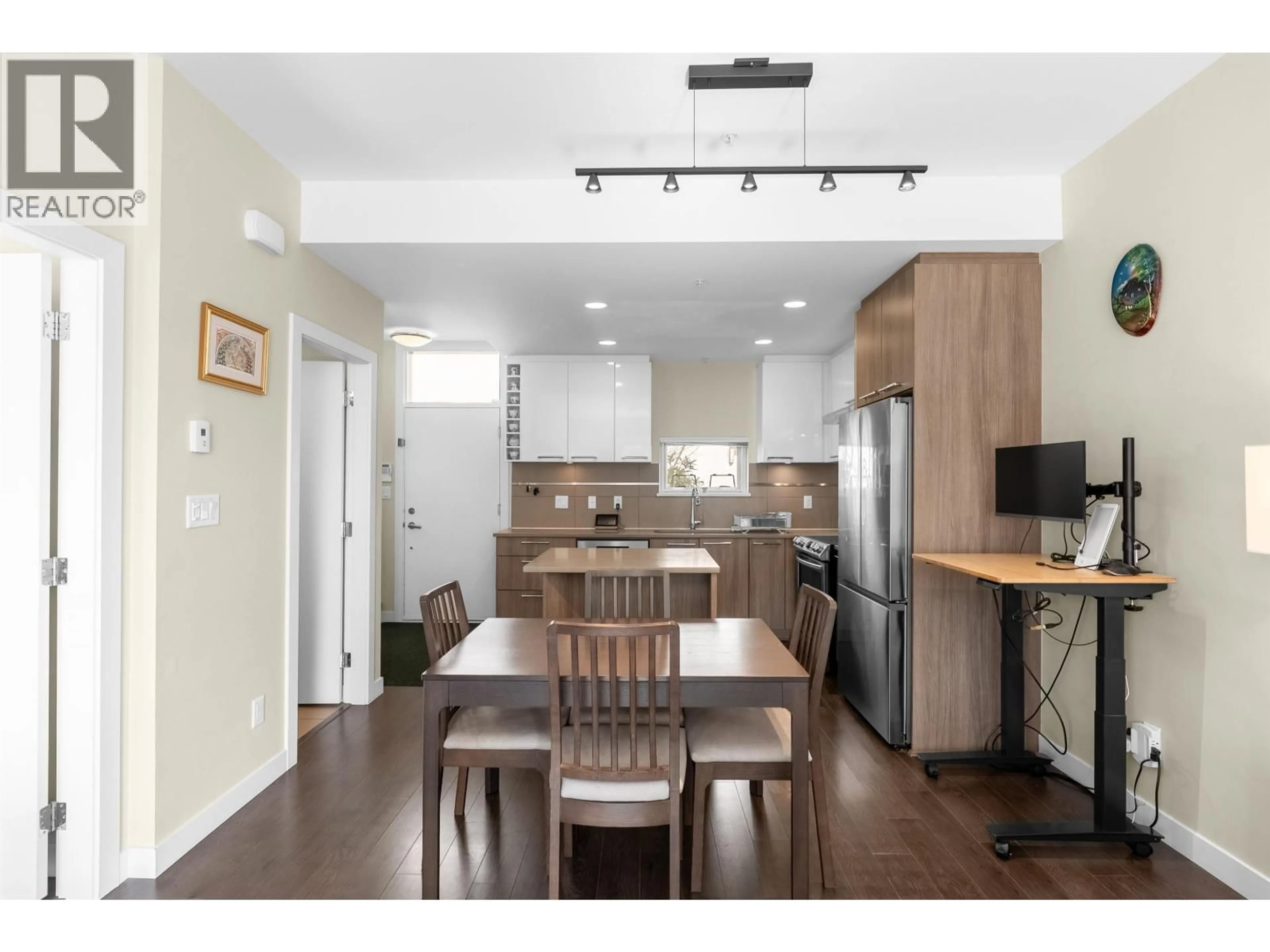 Open concept kitchen, wood/laminate floor for 407 - 9350 UNIVERSITY HIGH STREET, Burnaby British Columbia V5A0B6