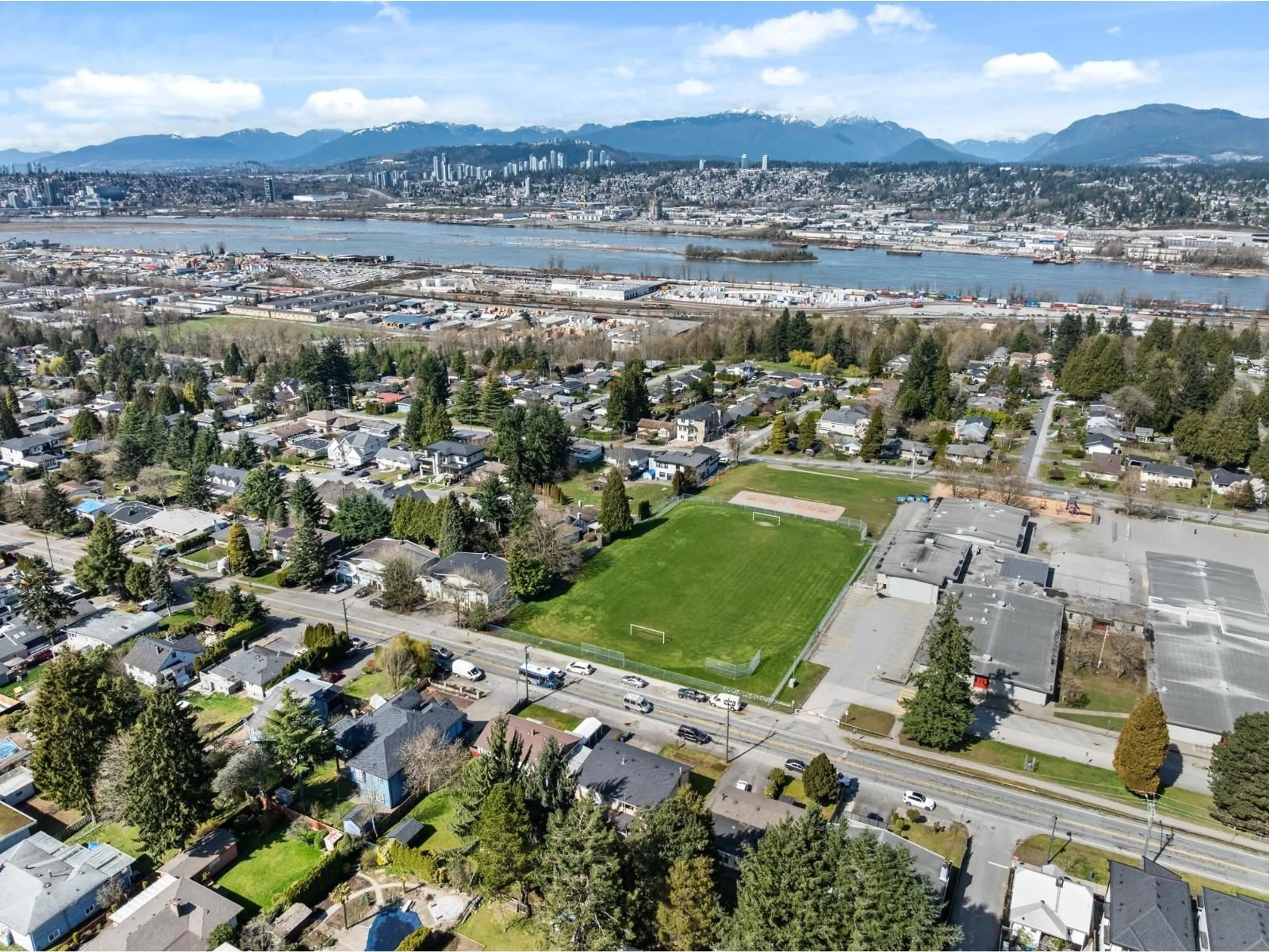 A pic from outside/outdoor area/front of a property/back of a property/a pic from drone, mountain view for 13728 112 AVENUE, Surrey British Columbia V3R2G3