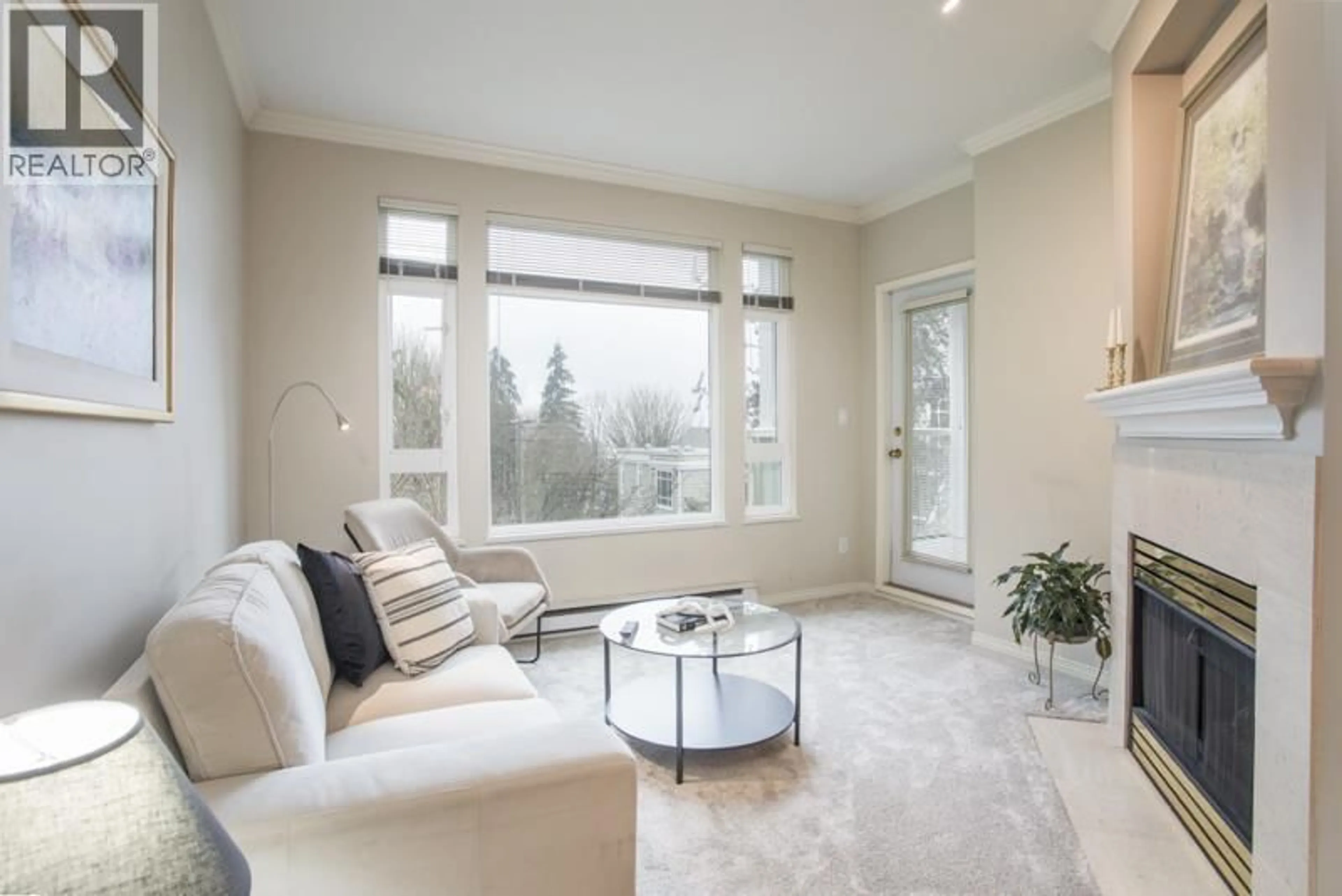 Living room with furniture, unknown for 606 - 3001 TERRAVISTA PLACE, Port Moody British Columbia V3H5A2