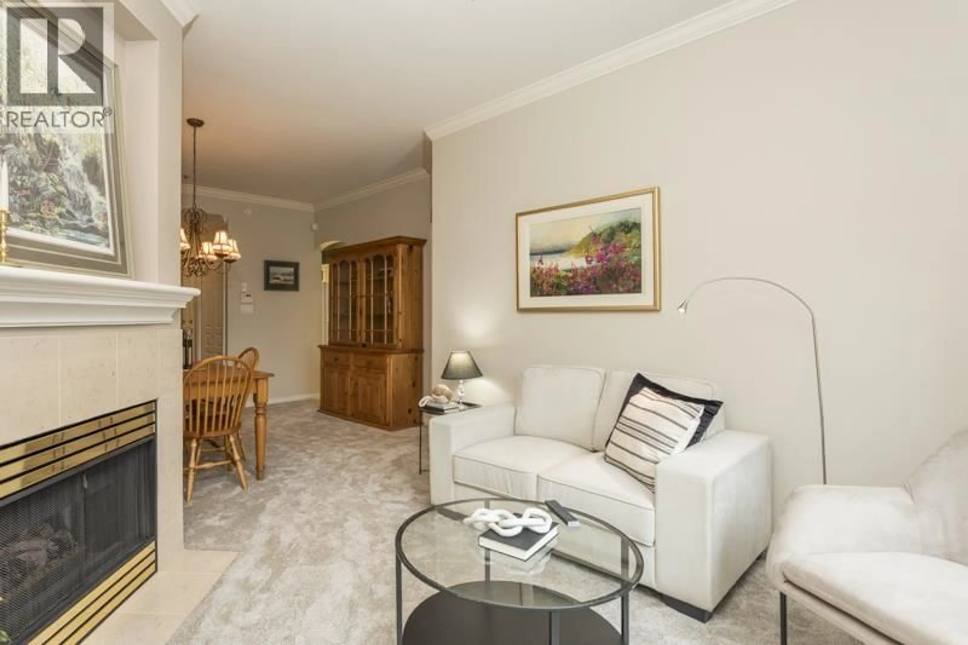 Living room with furniture, unknown for 606 - 3001 TERRAVISTA PLACE, Port Moody British Columbia V3H5A2