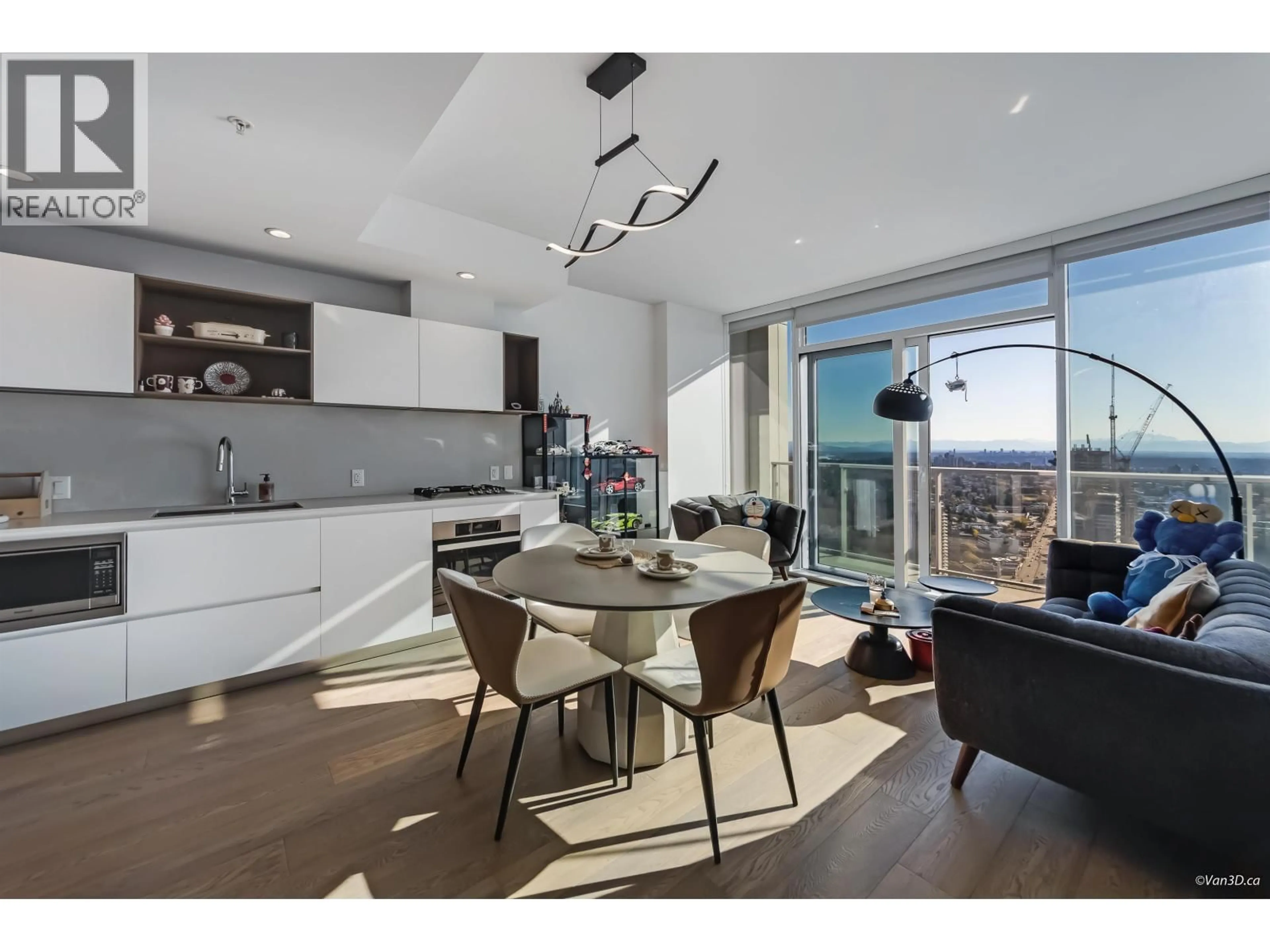 Open concept kitchen, wood/laminate floor for 4709 - 6000 MCKAY AVENUE, Burnaby British Columbia V5H0K2