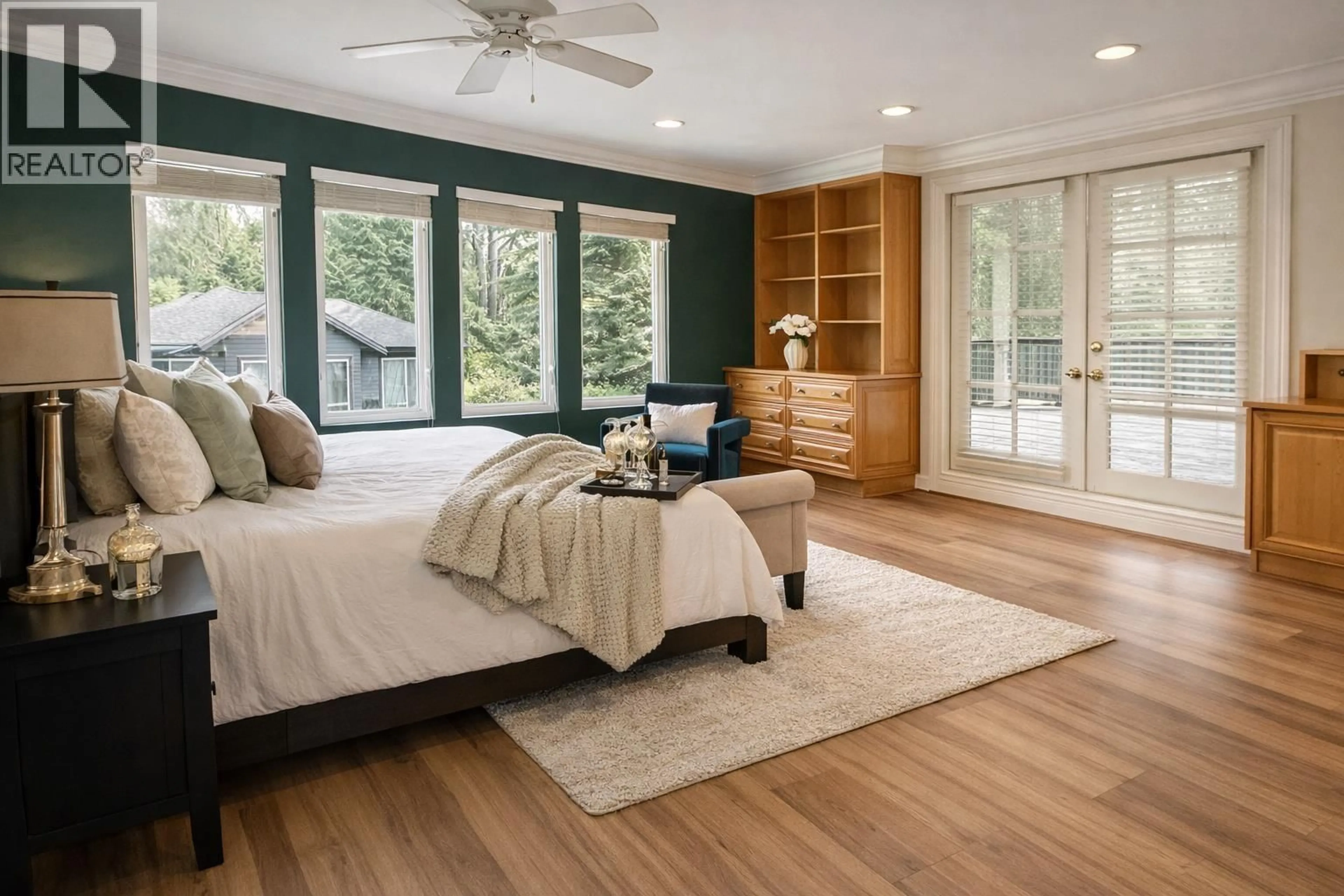 Bedroom with bed, wood/laminate floor for 4786 4TH AVENUE, Vancouver British Columbia V6T1C2