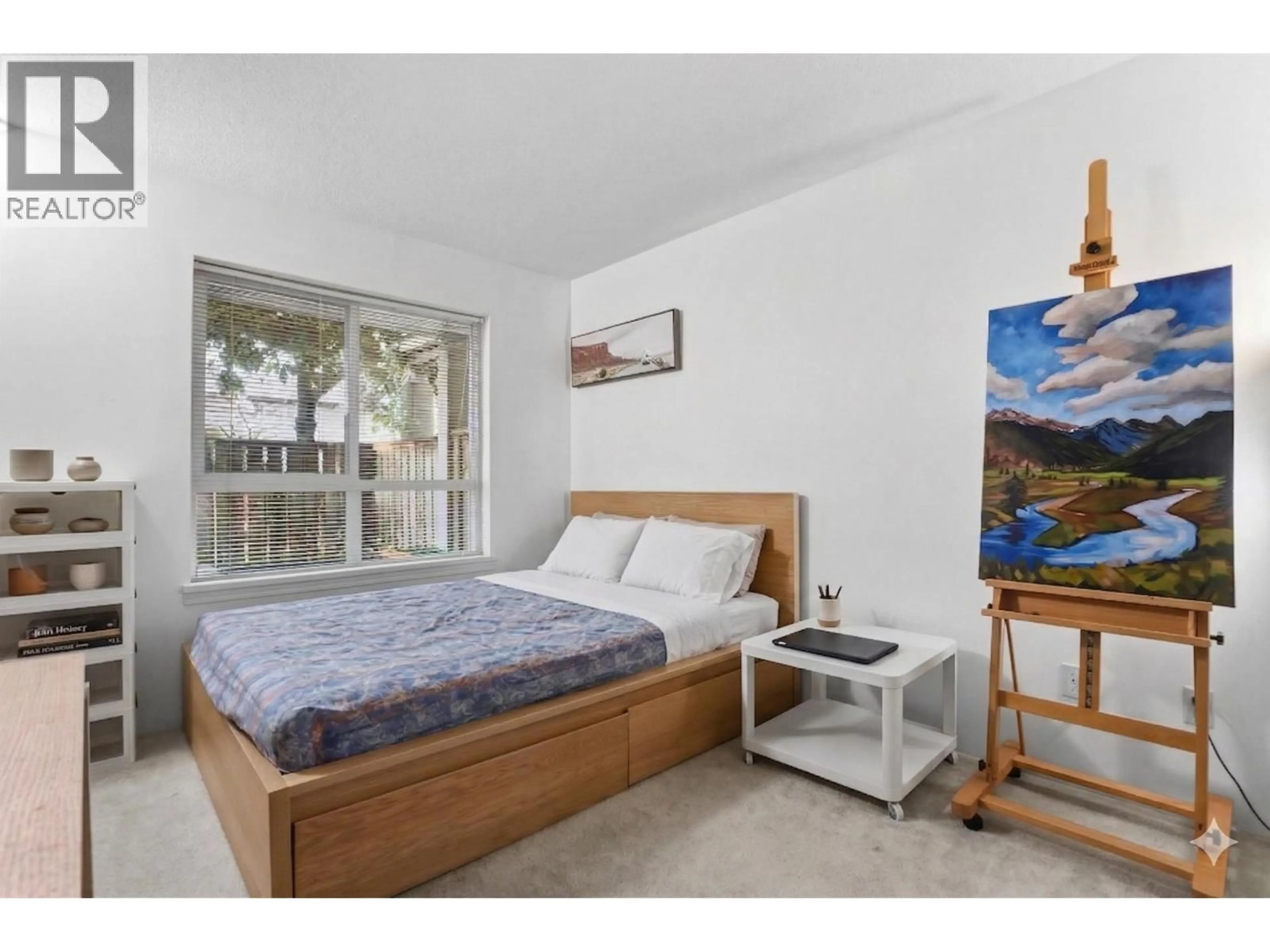 Bedroom with bed, unknown for 103 - 3480 YARDLEY AVENUE, Vancouver British Columbia V5R6B3