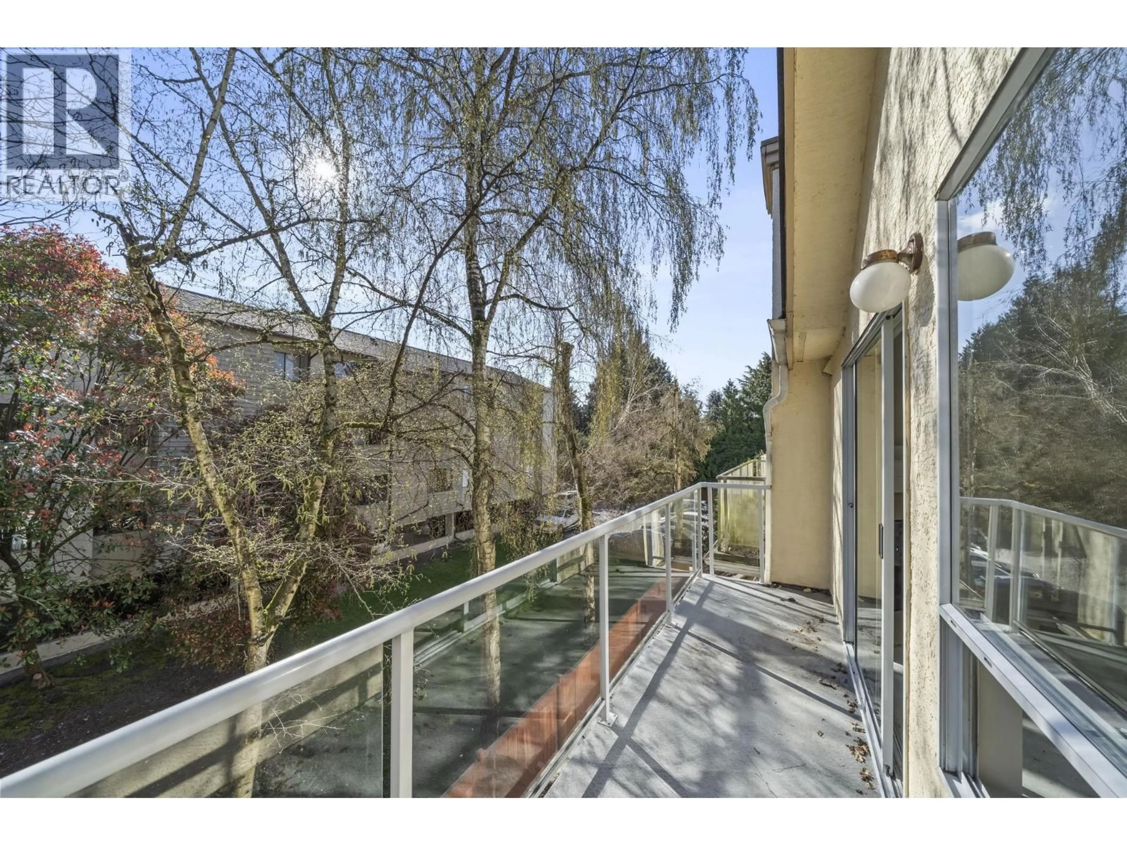 Balcony in the apartment, city buildings view from balcony for 302 - 8600 WESTMINSTER HIGHWAY, Richmond British Columbia V6X1A8