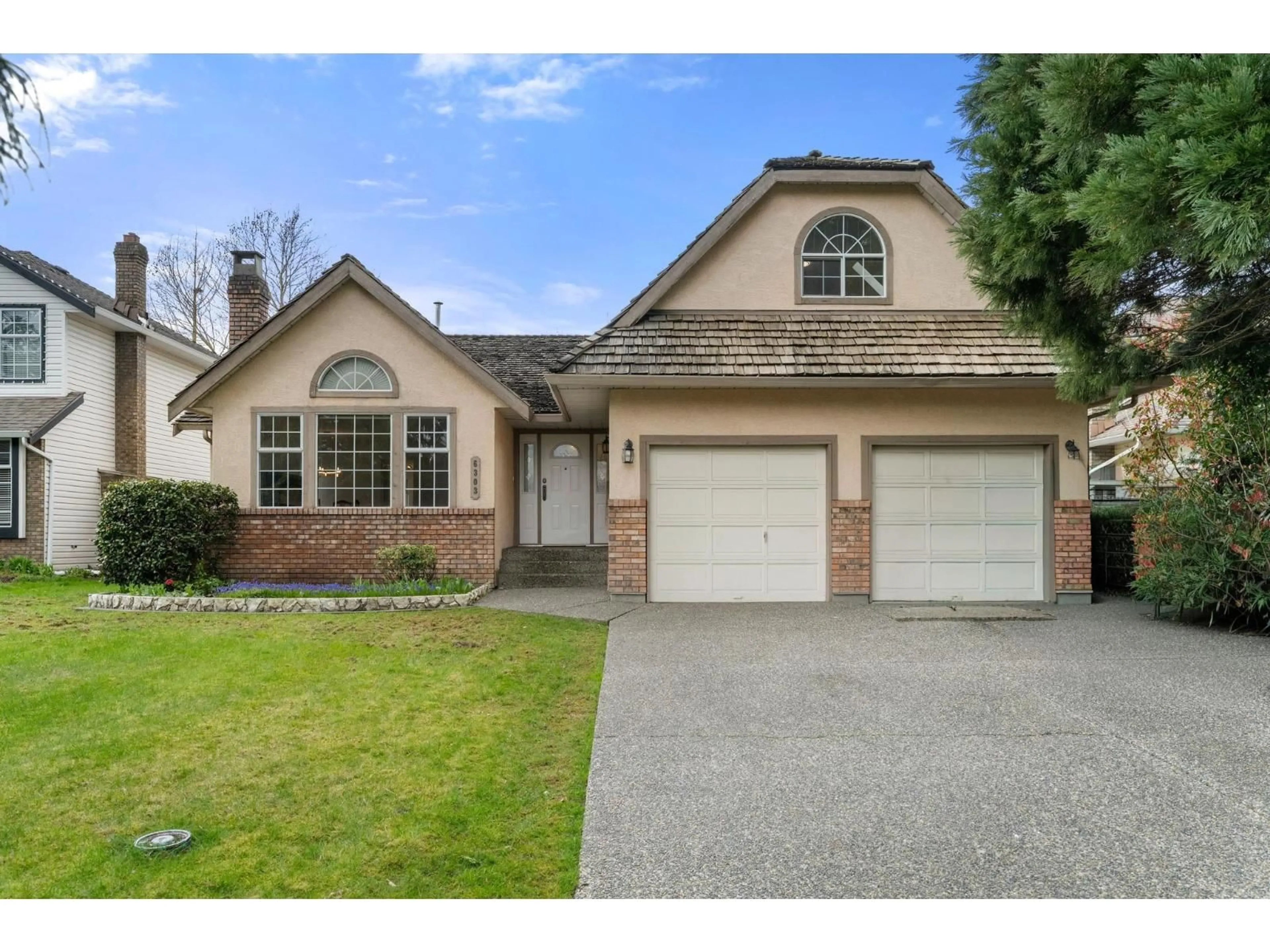 Home with vinyl exterior material, street for 6303 187A STREET, Surrey British Columbia V3S7N9