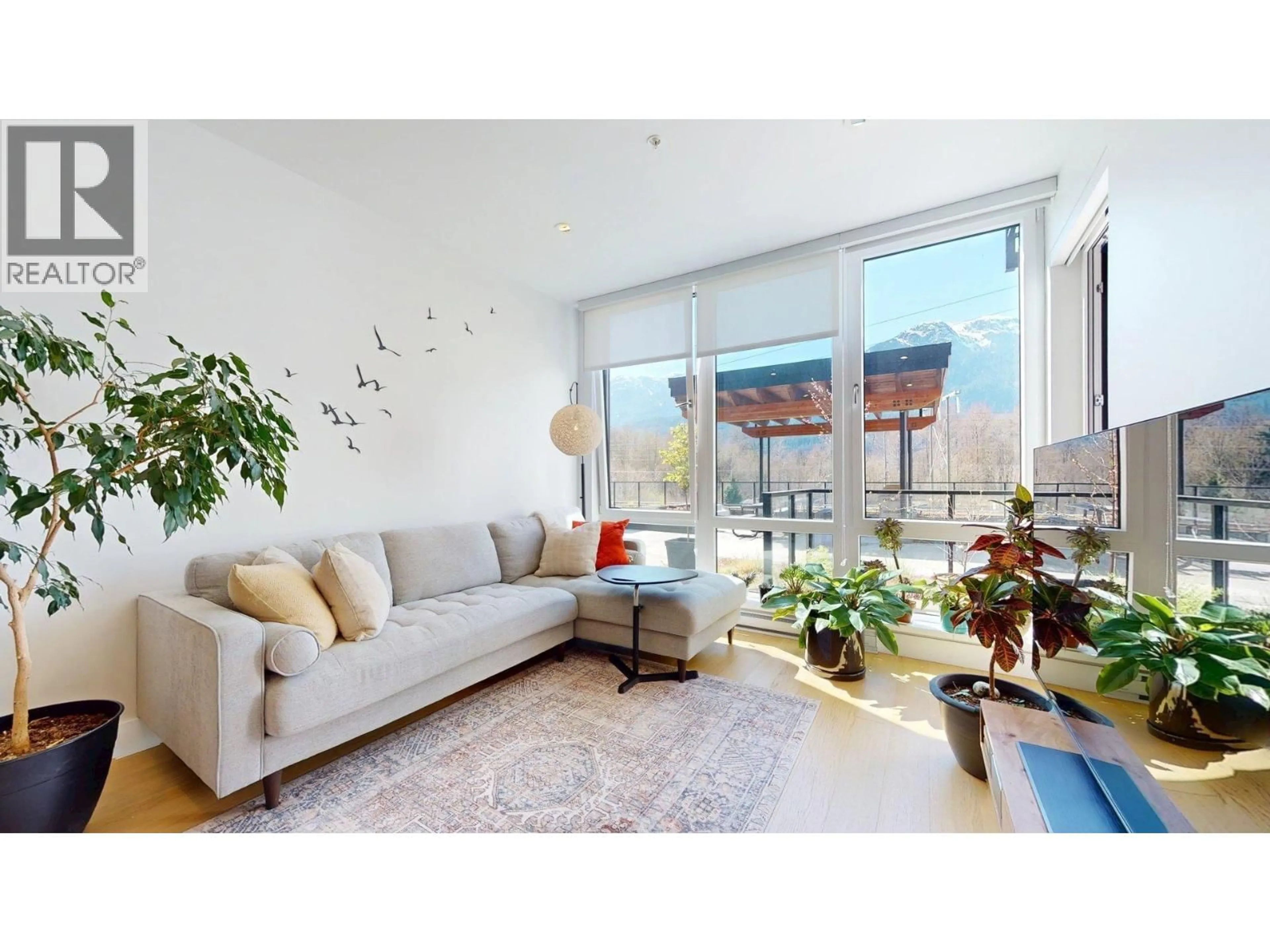 Living room with furniture, unknown for 213 - 1870 DOWAD DRIVE, Squamish British Columbia V8B1C4