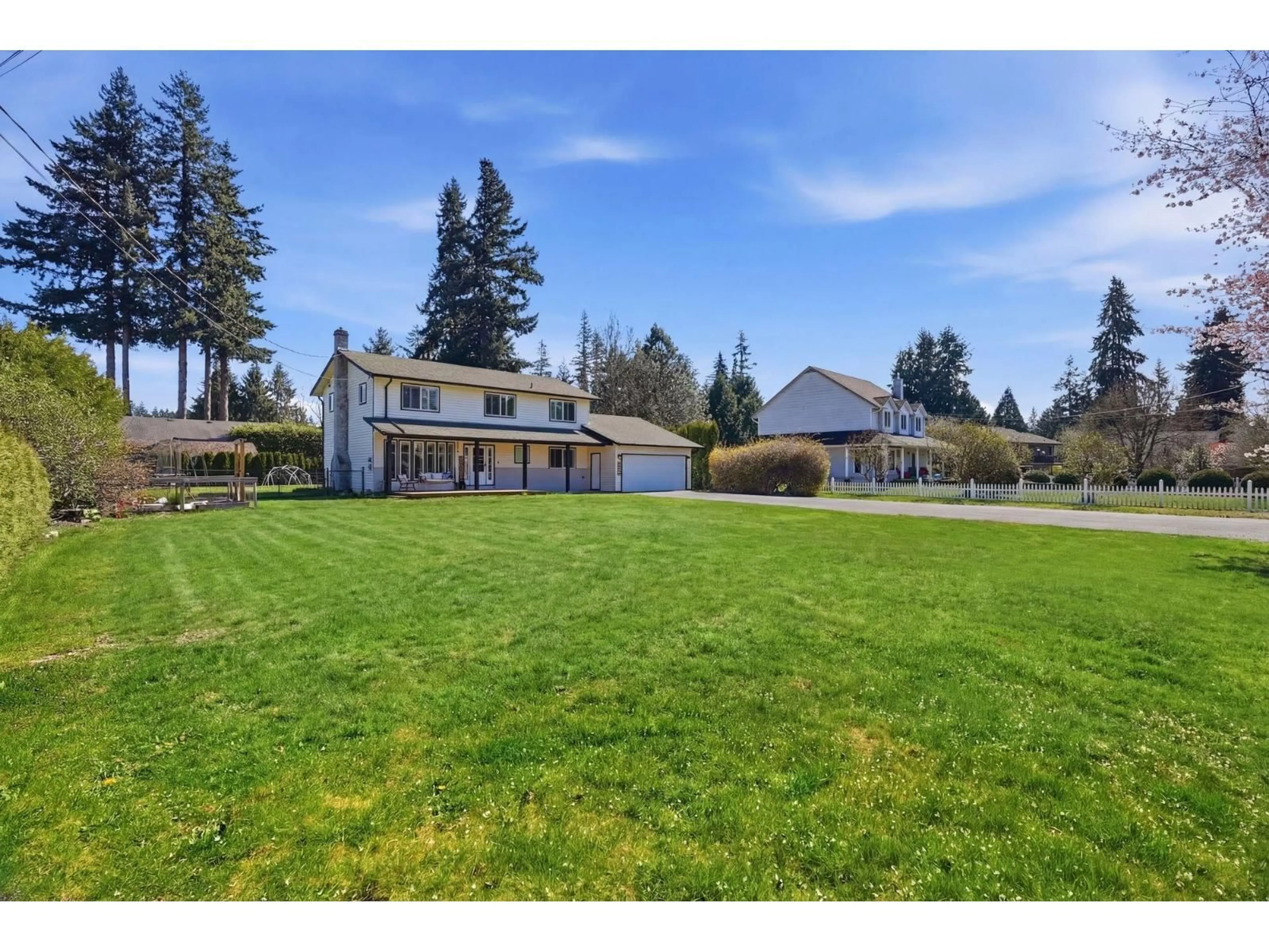 A pic from outside/outdoor area/front of a property/back of a property/a pic from drone, mountain view for 5692 247A STREET, Langley British Columbia V2Z1H2
