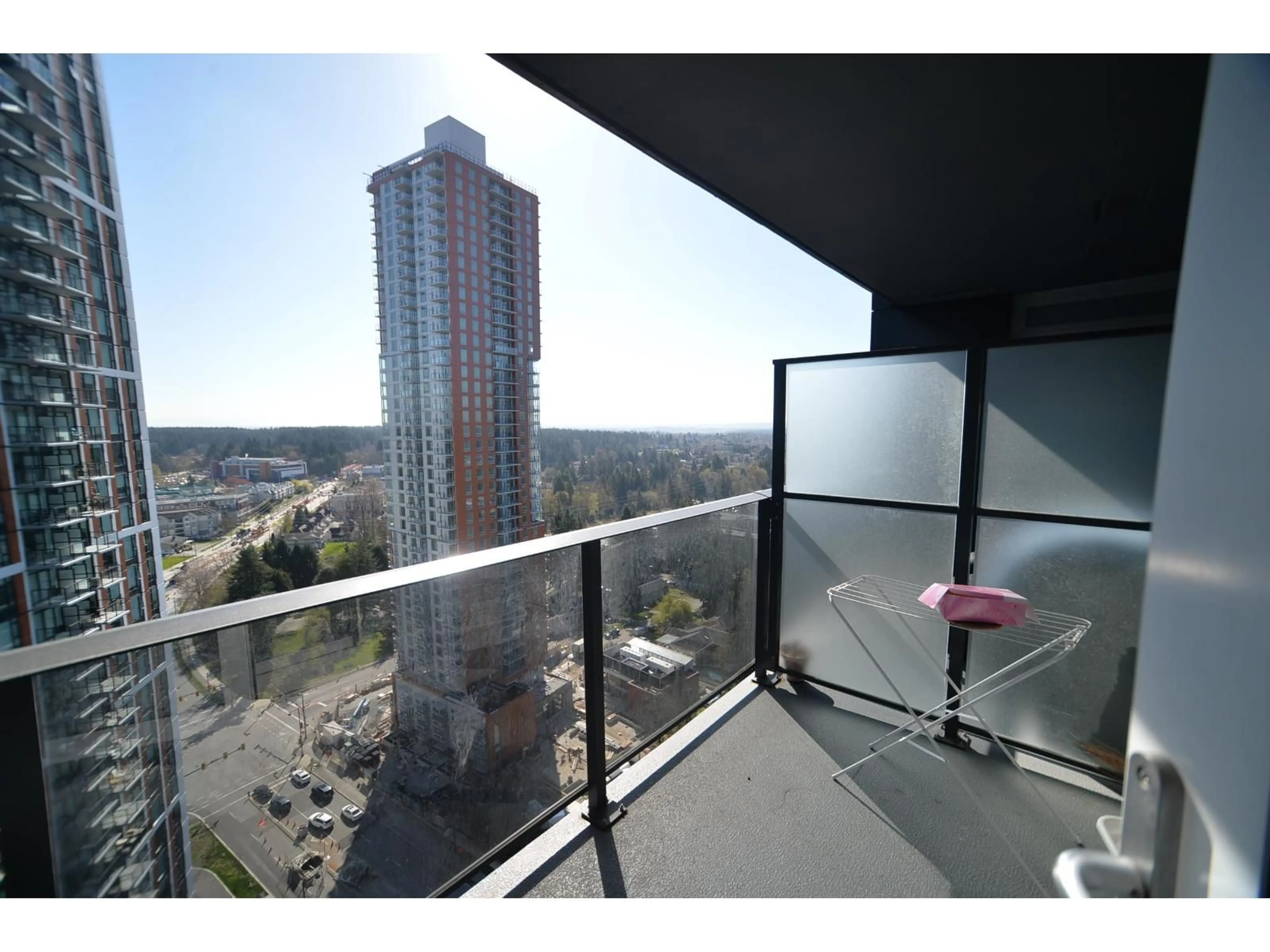 Balcony in the apartment, city buildings view from balcony for 2408 - 13655 FRASER HWY, Surrey British Columbia V3T0P8