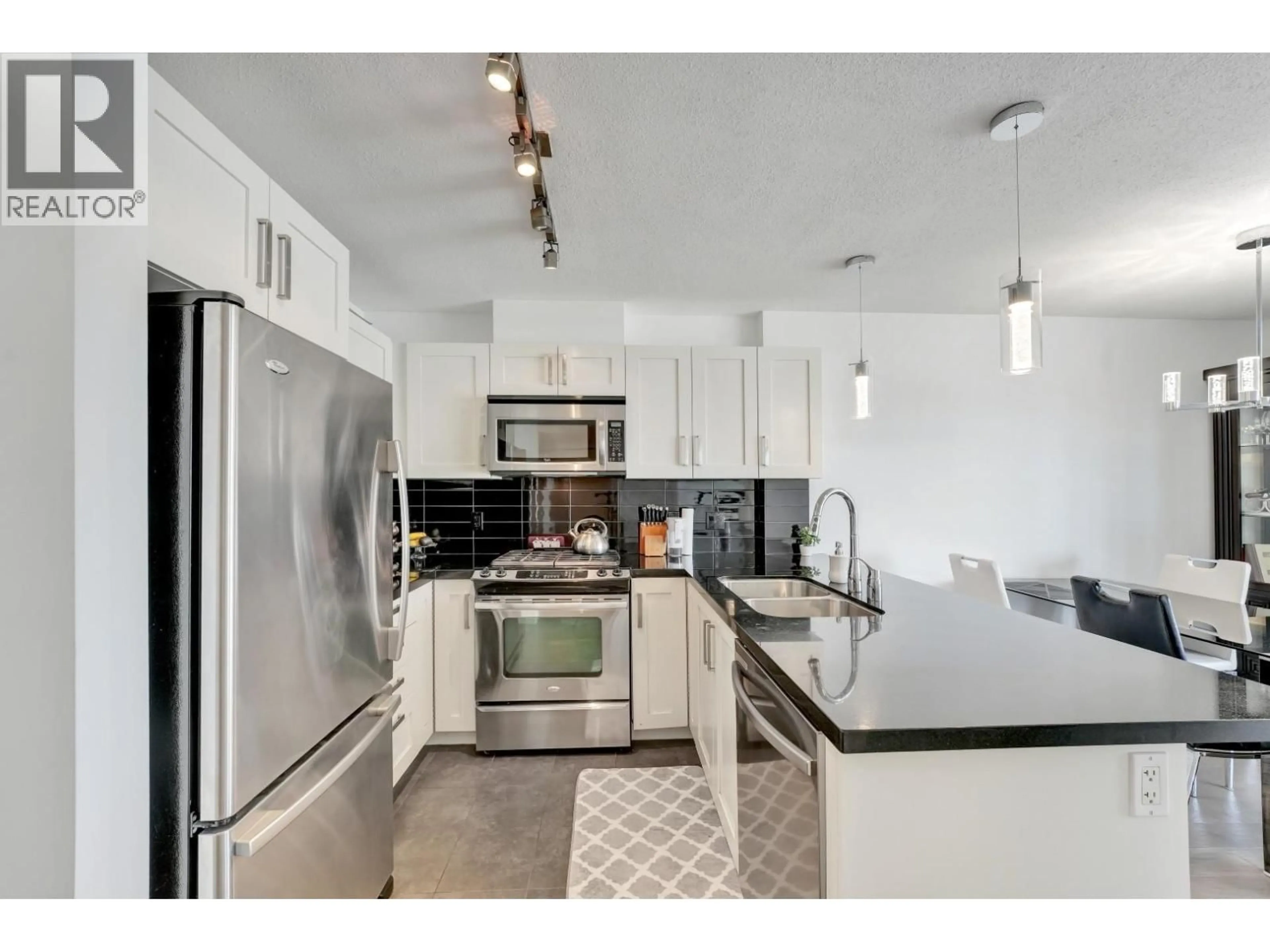 Open concept kitchen, ceramic/tile floor for 1106 - 2133 DOUGLAS ROAD, Burnaby British Columbia V5C0E9