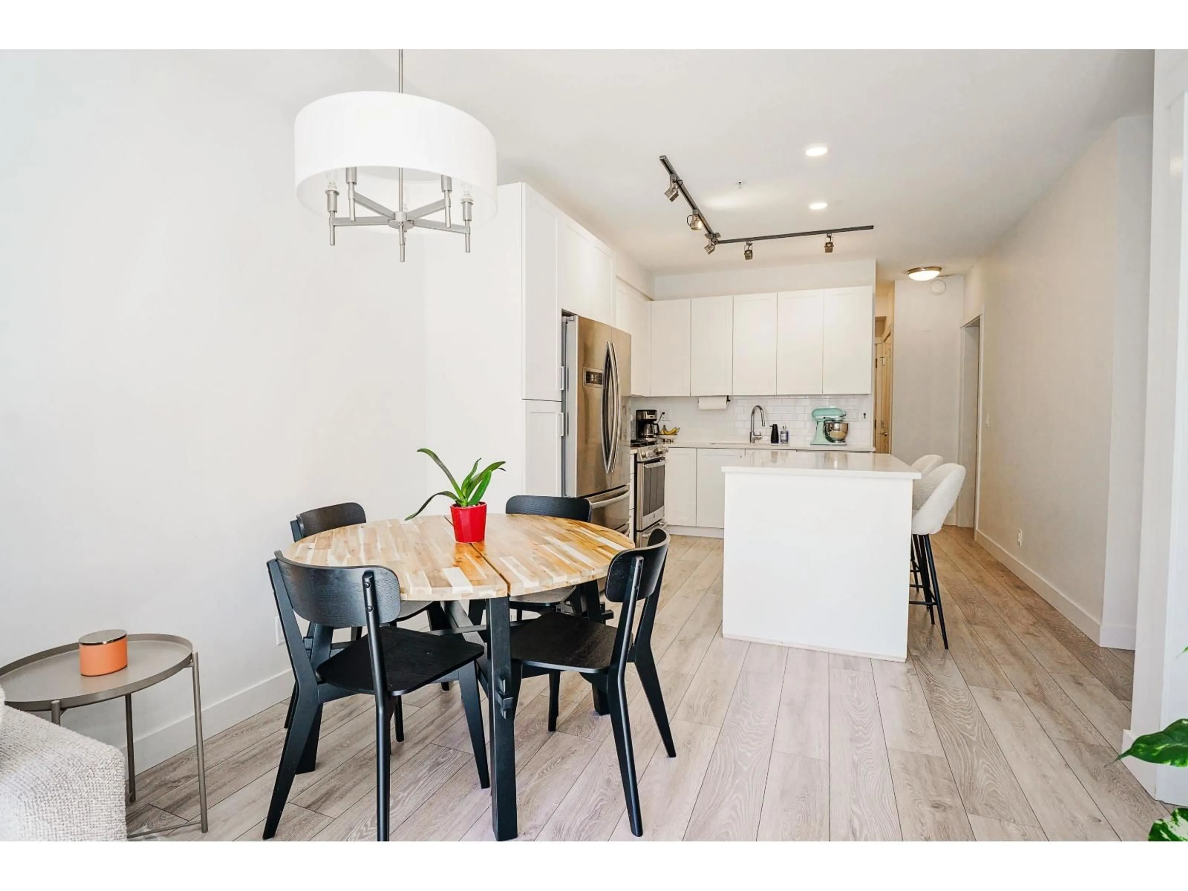 Open concept kitchen, wood/laminate floor for 105 - 20673 78 AVENUE, Langley British Columbia V2Y3K1