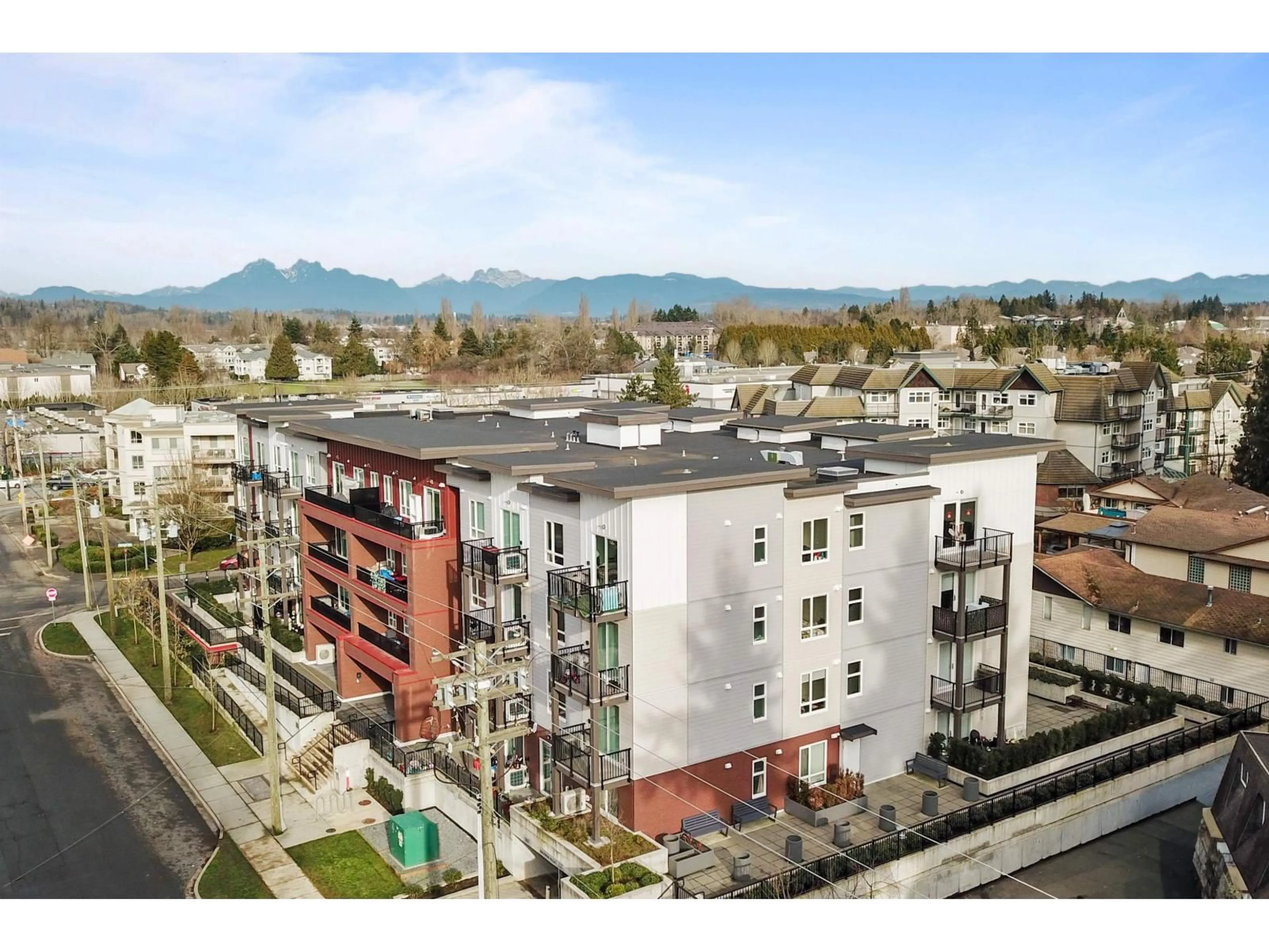 A pic from outside/outdoor area/front of a property/back of a property/a pic from drone, mountain view for 401 - 5420 208 STREET, Langley British Columbia V3A2J9