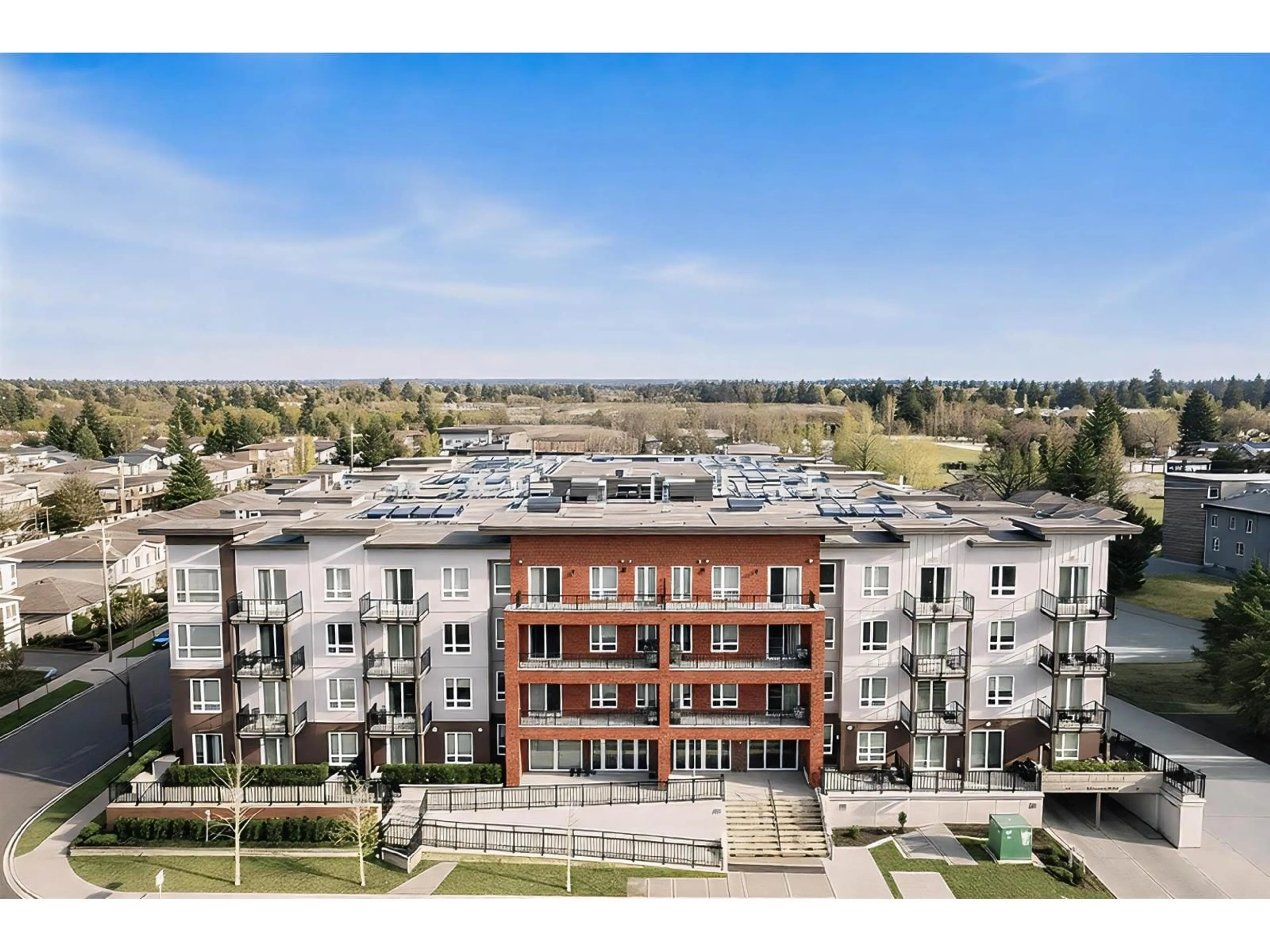 A pic from outside/outdoor area/front of a property/back of a property/a pic from drone, unknown for 401 - 5420 208 STREET, Langley British Columbia V3A2J9