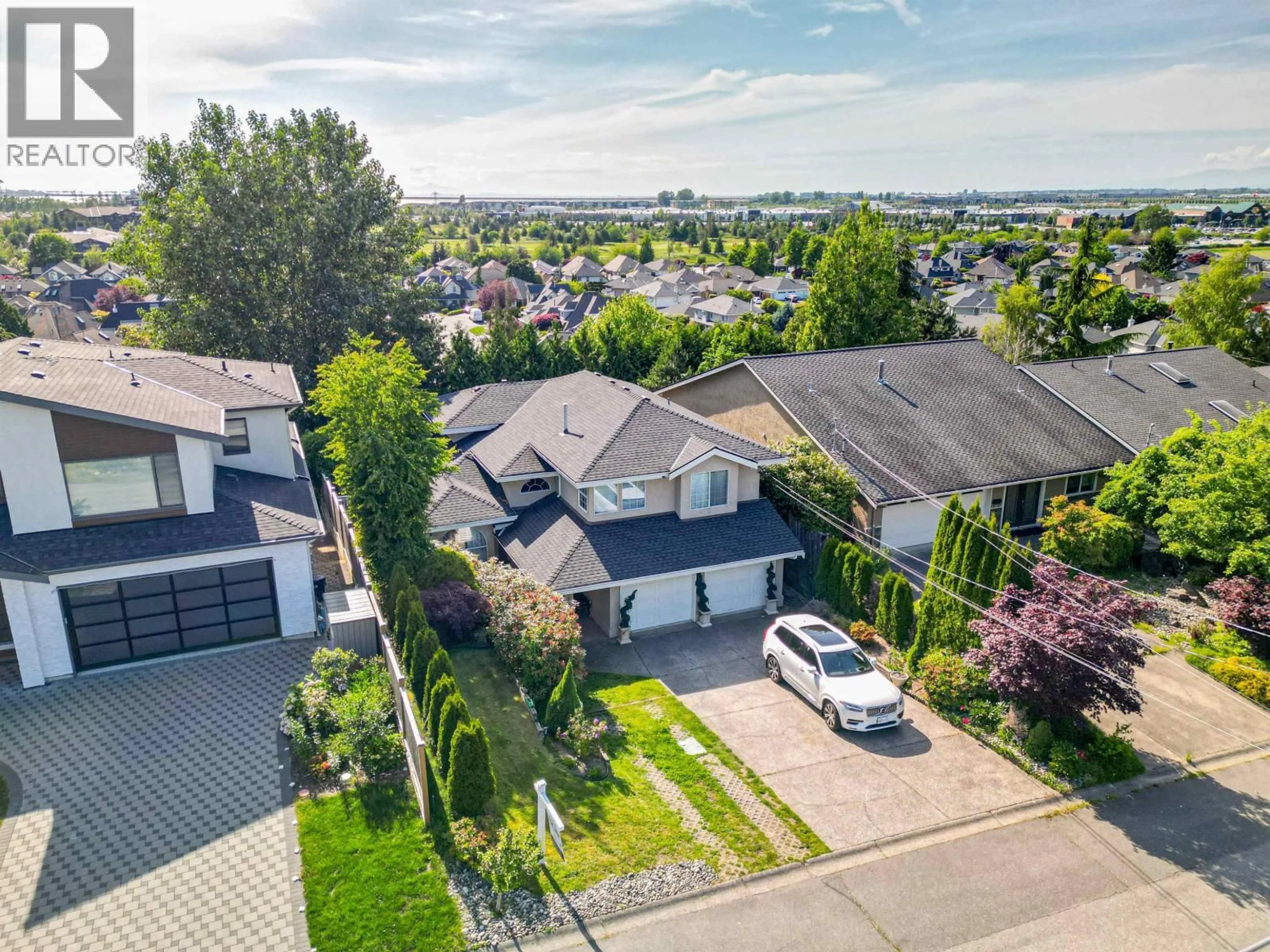 A pic from outside/outdoor area/front of a property/back of a property/a pic from drone, street for 1641 53A STREET, Delta British Columbia V4M3G3