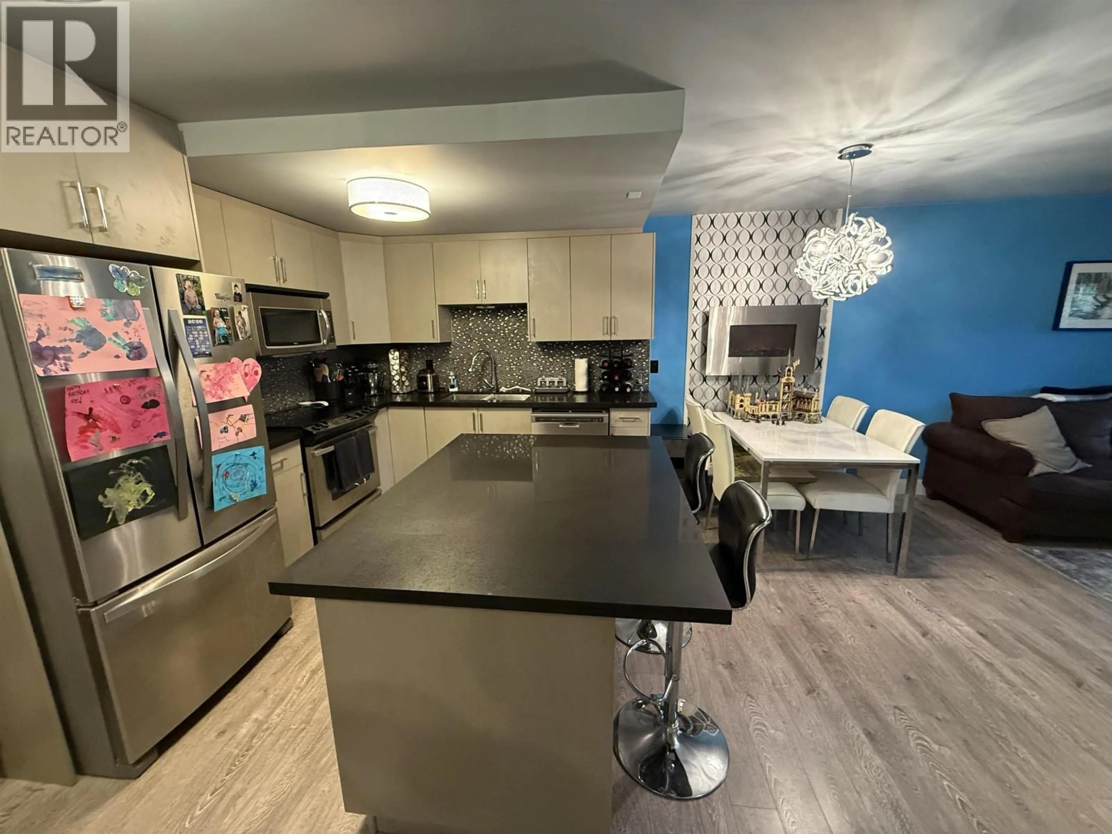 Open concept kitchen, unknown for 117 - 2416 3RD AVENUE, Vancouver British Columbia V6K1L8