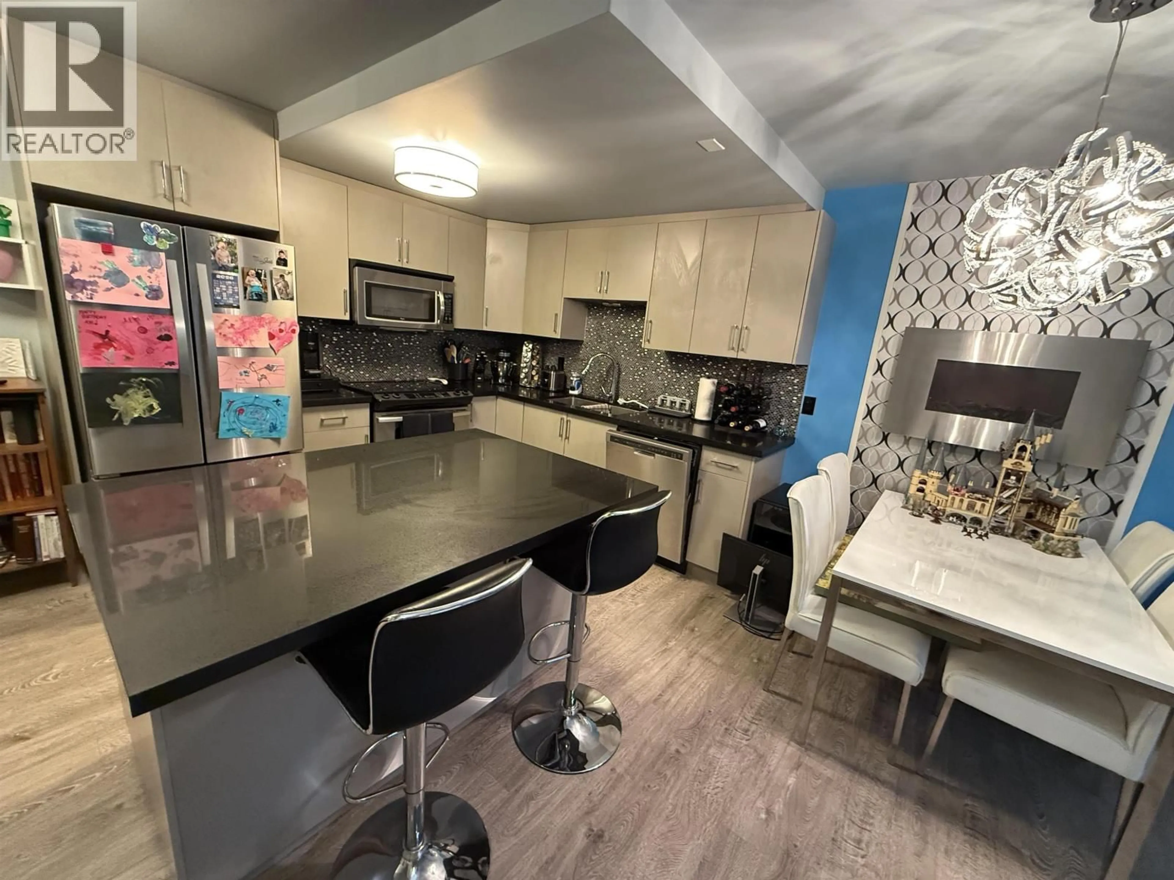 Open concept kitchen, unknown for 117 - 2416 3RD AVENUE, Vancouver British Columbia V6K1L8