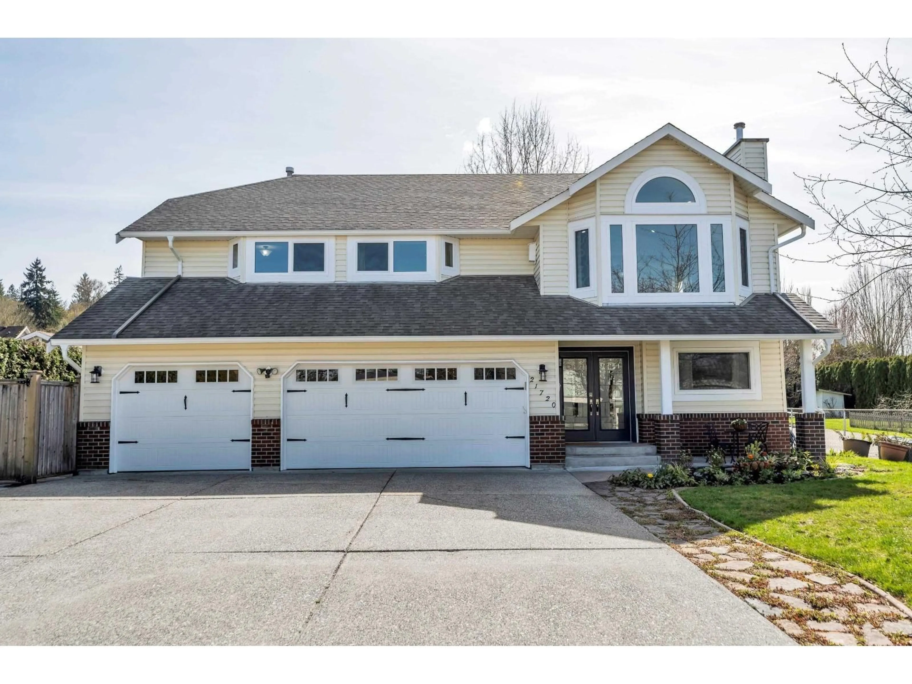 Home with vinyl exterior material, street for 21720 50 AVENUE, Langley British Columbia V3A3T3