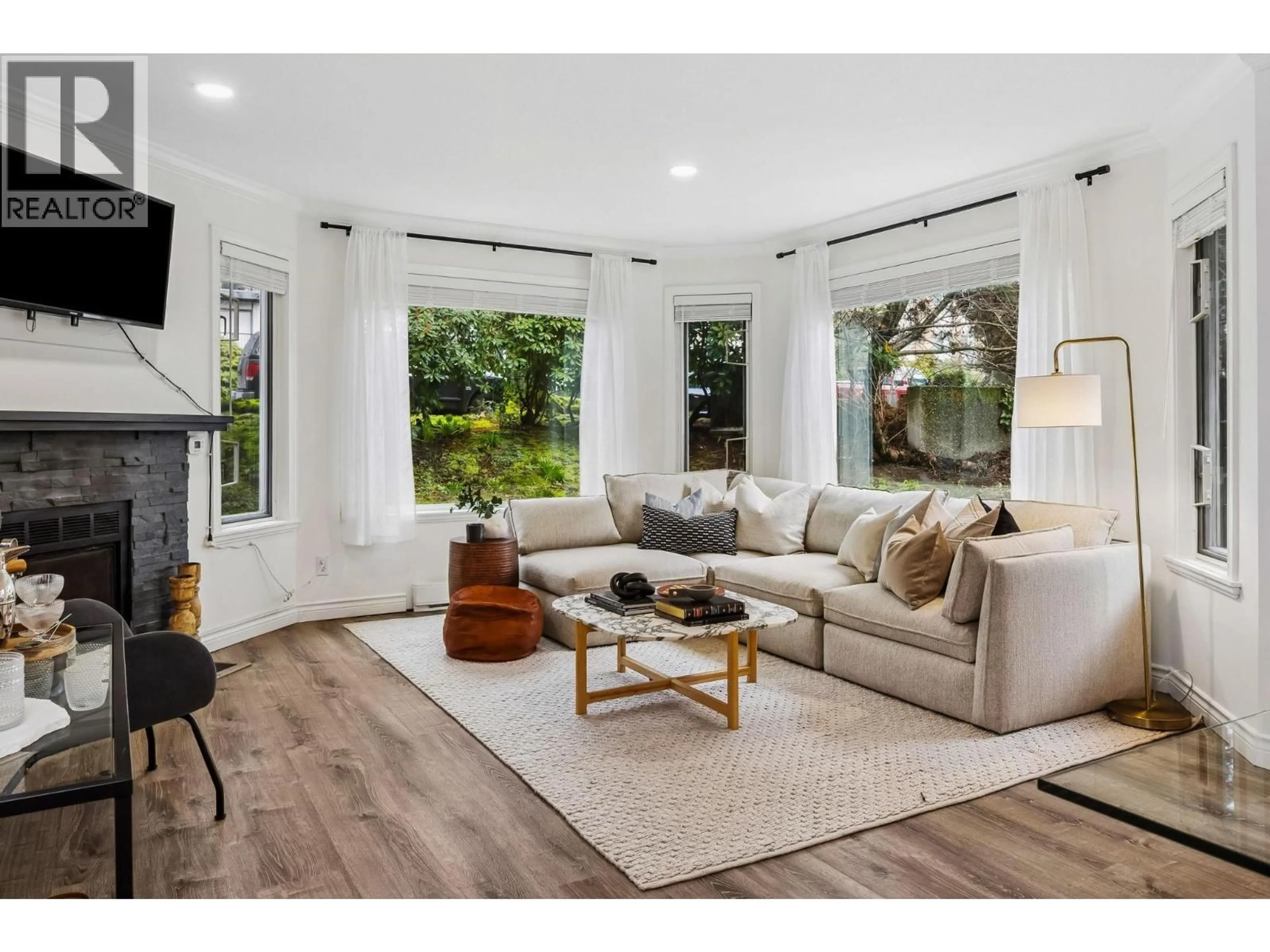 Living room with furniture, unknown for 107 - 175 4TH STREET, North Vancouver British Columbia V7M1H6