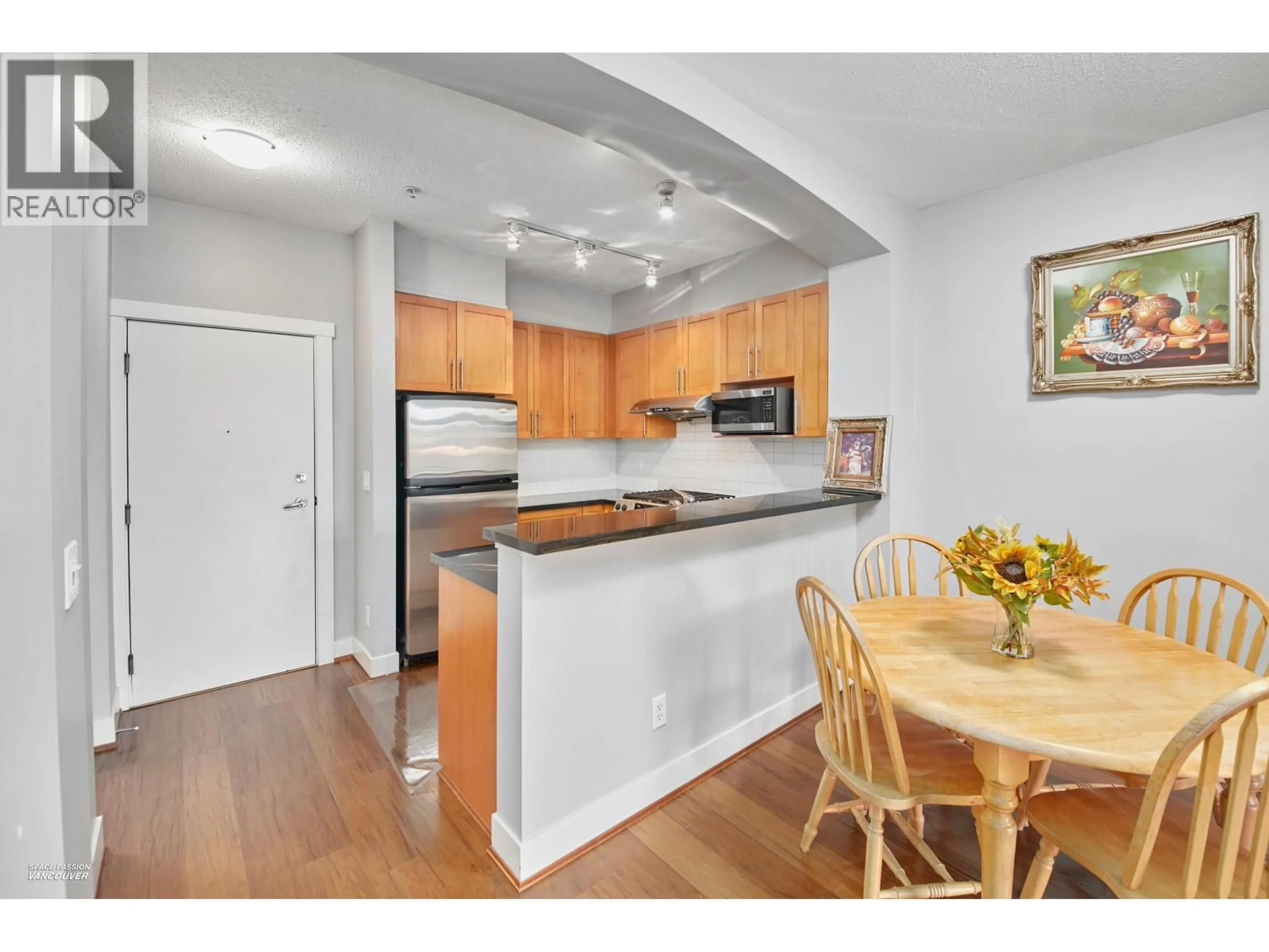 Standard kitchen, wood/laminate floor for 212 - 2250 WESBROOK MALL, Vancouver British Columbia V6T0A6