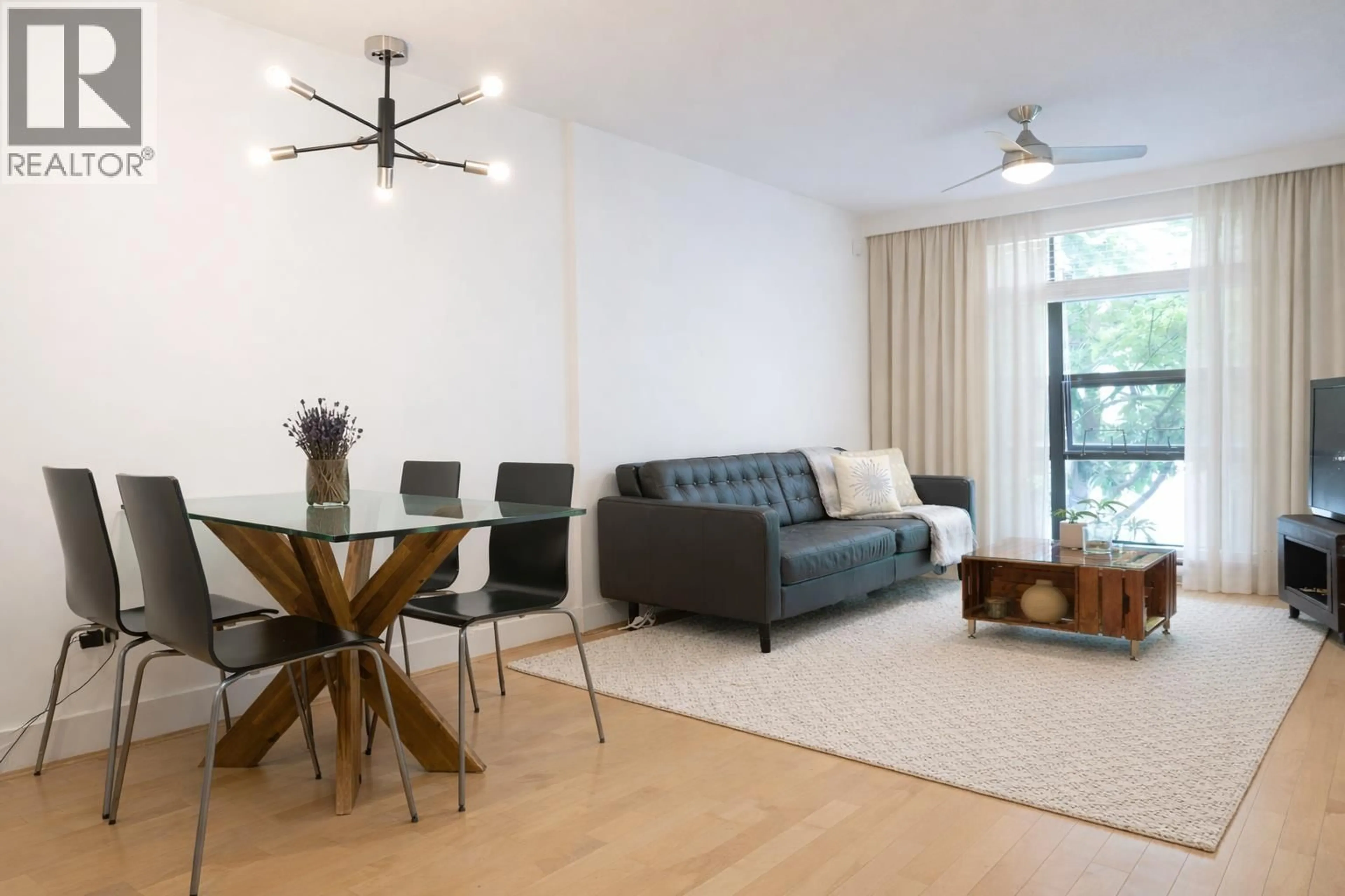 Living room with furniture, wood/laminate floor for 206 - 2137 10 AVENUE, Vancouver British Columbia V6K4W4