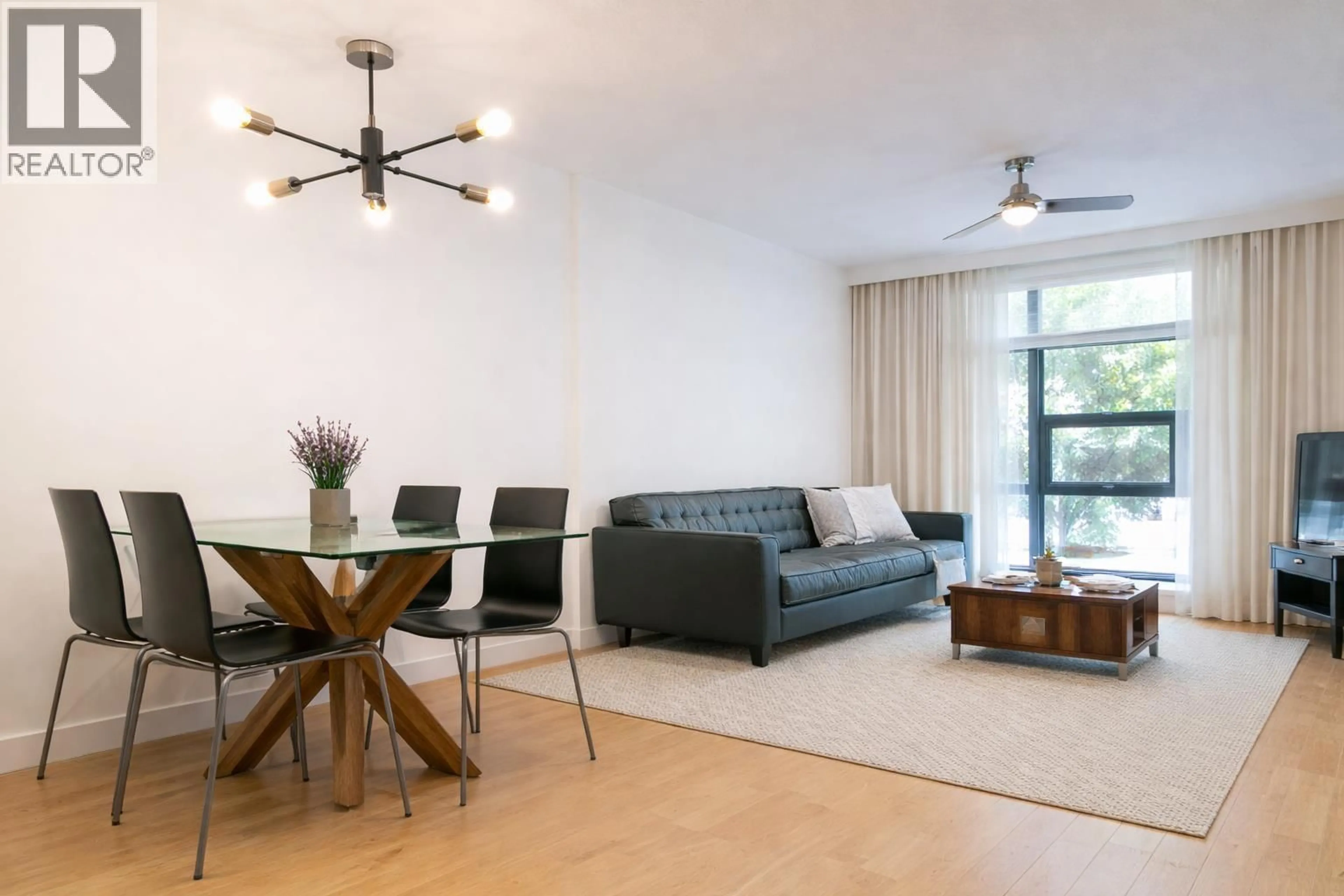Living room with furniture, wood/laminate floor for 206 - 2137 10 AVENUE, Vancouver British Columbia V6K4W4