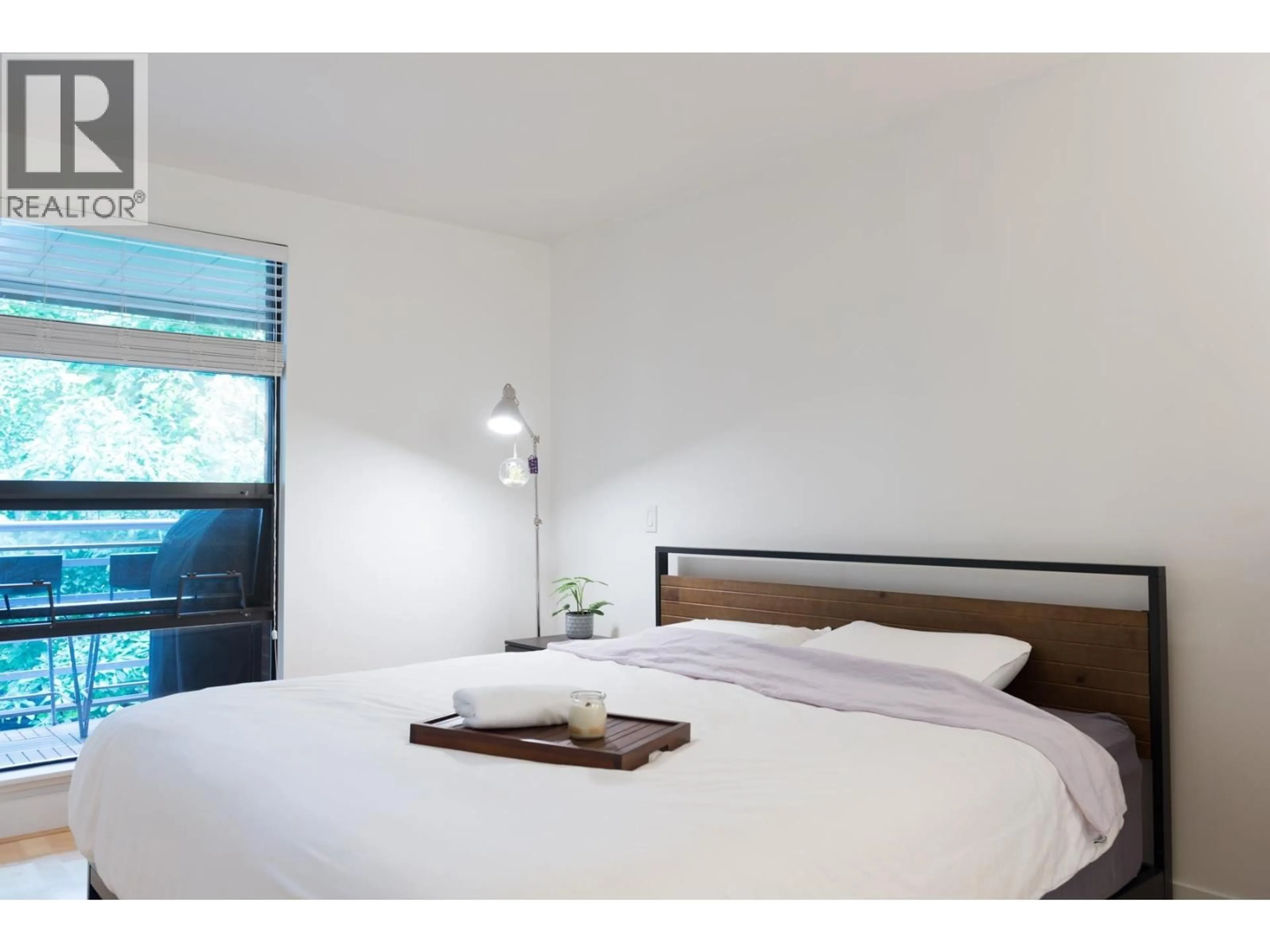 Bedroom with bed, unknown for 206 - 2137 10 AVENUE, Vancouver British Columbia V6K4W4