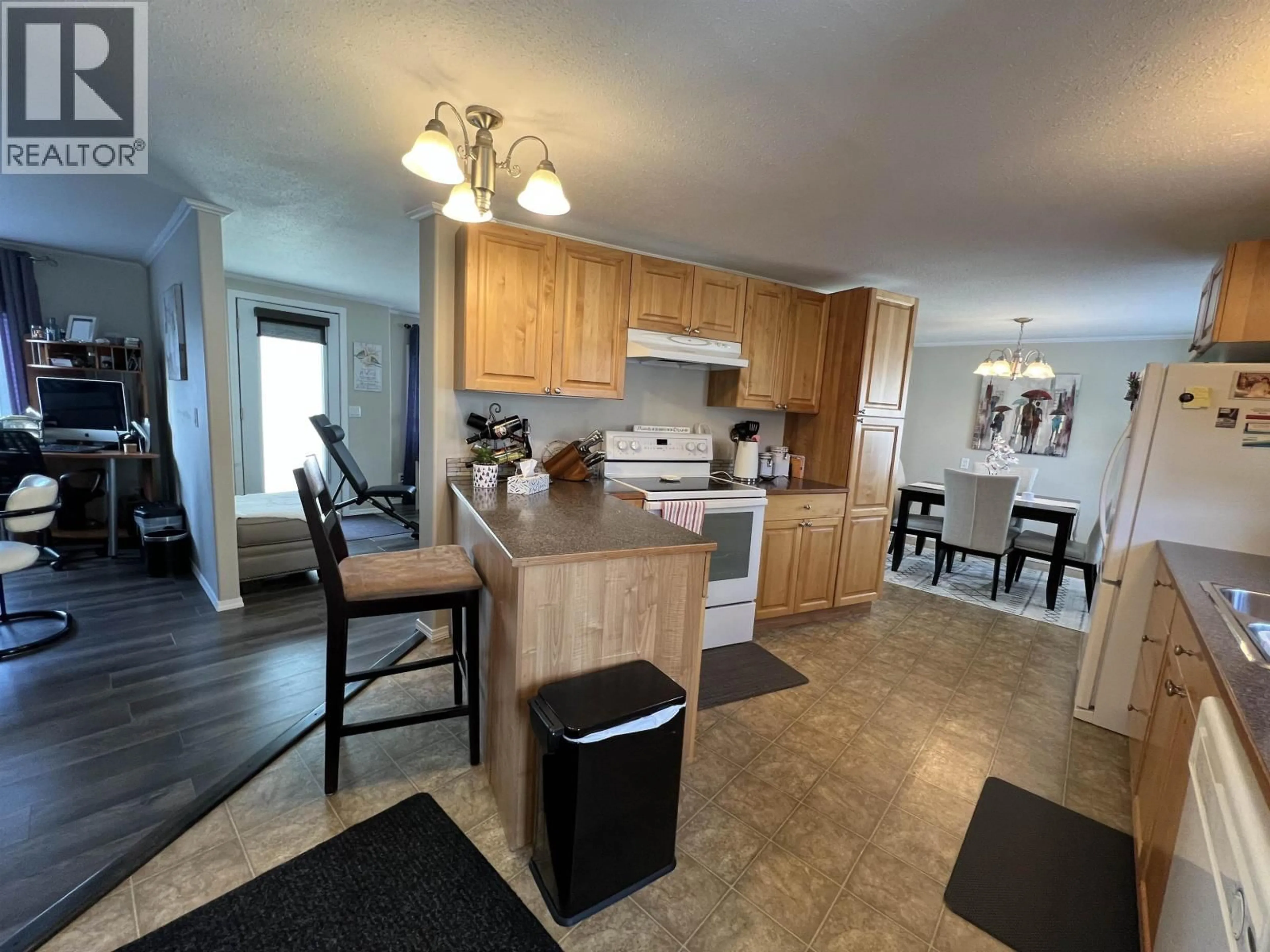 Open concept kitchen, unknown for 4028 POPLAR AVENUE, Fort Nelson British Columbia V0C1R0