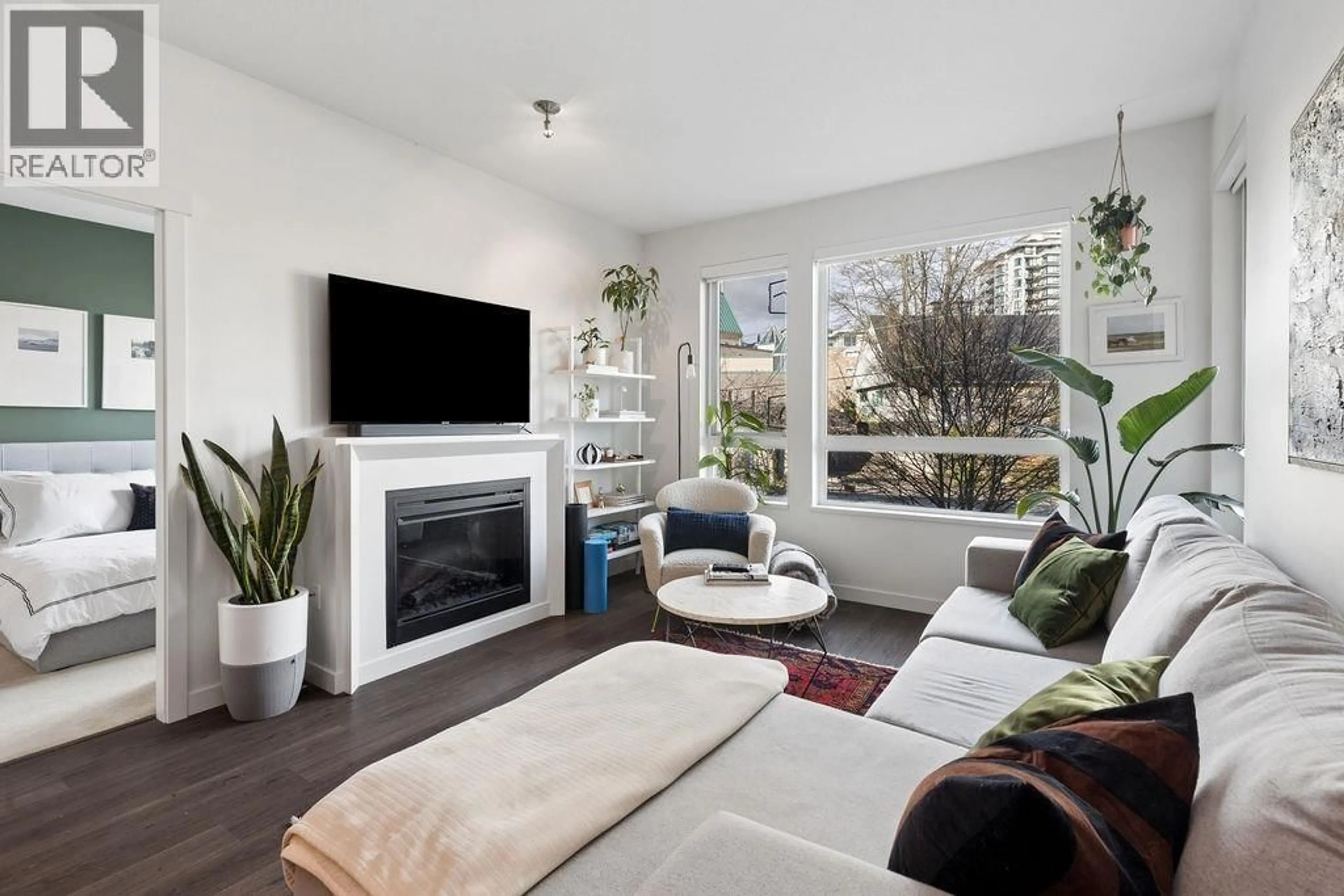 Living room with furniture, unknown for 207 - 217 8TH STREET, North Vancouver British Columbia V7M0C2