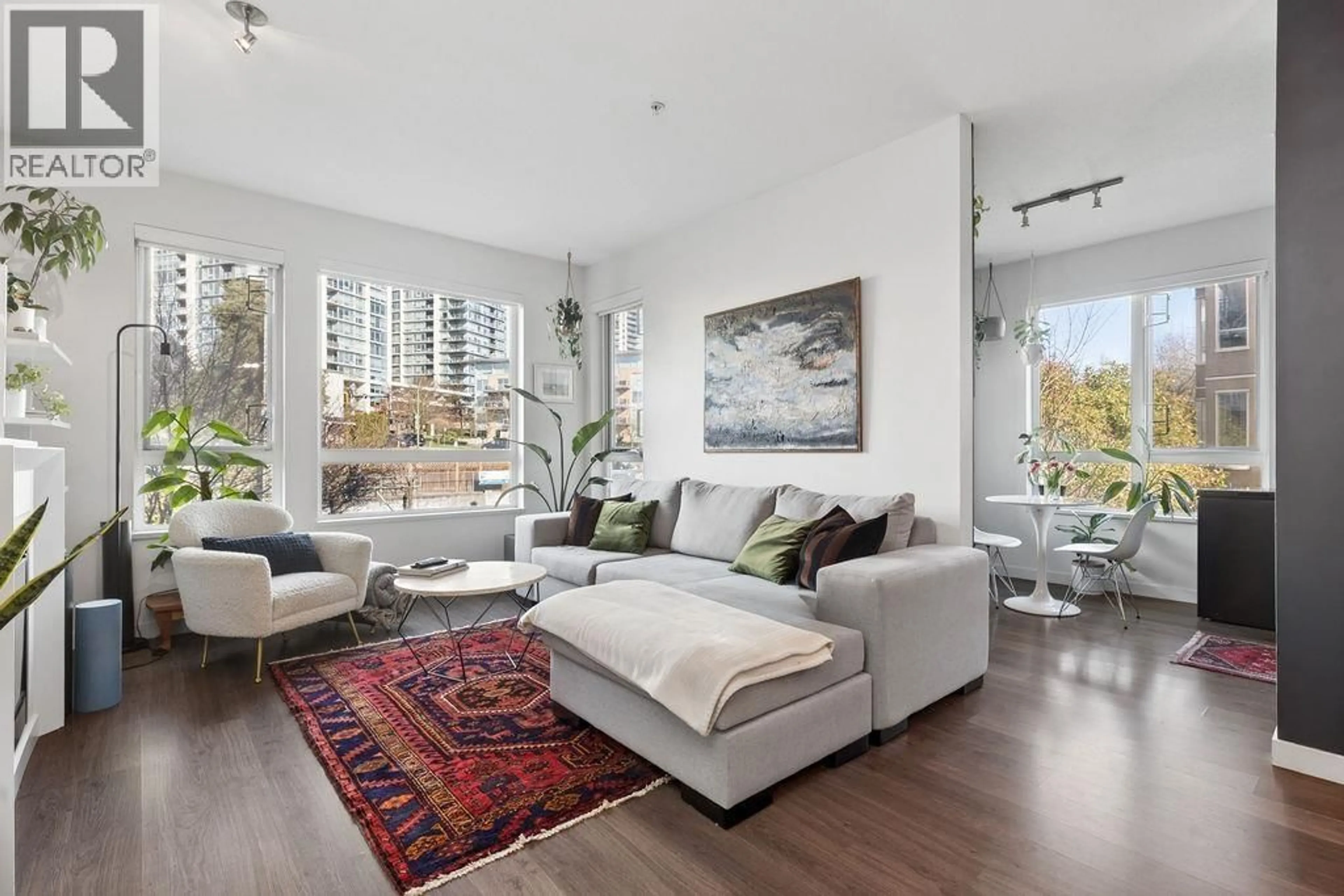 Living room with furniture, unknown for 207 - 217 8TH STREET, North Vancouver British Columbia V7M0C2