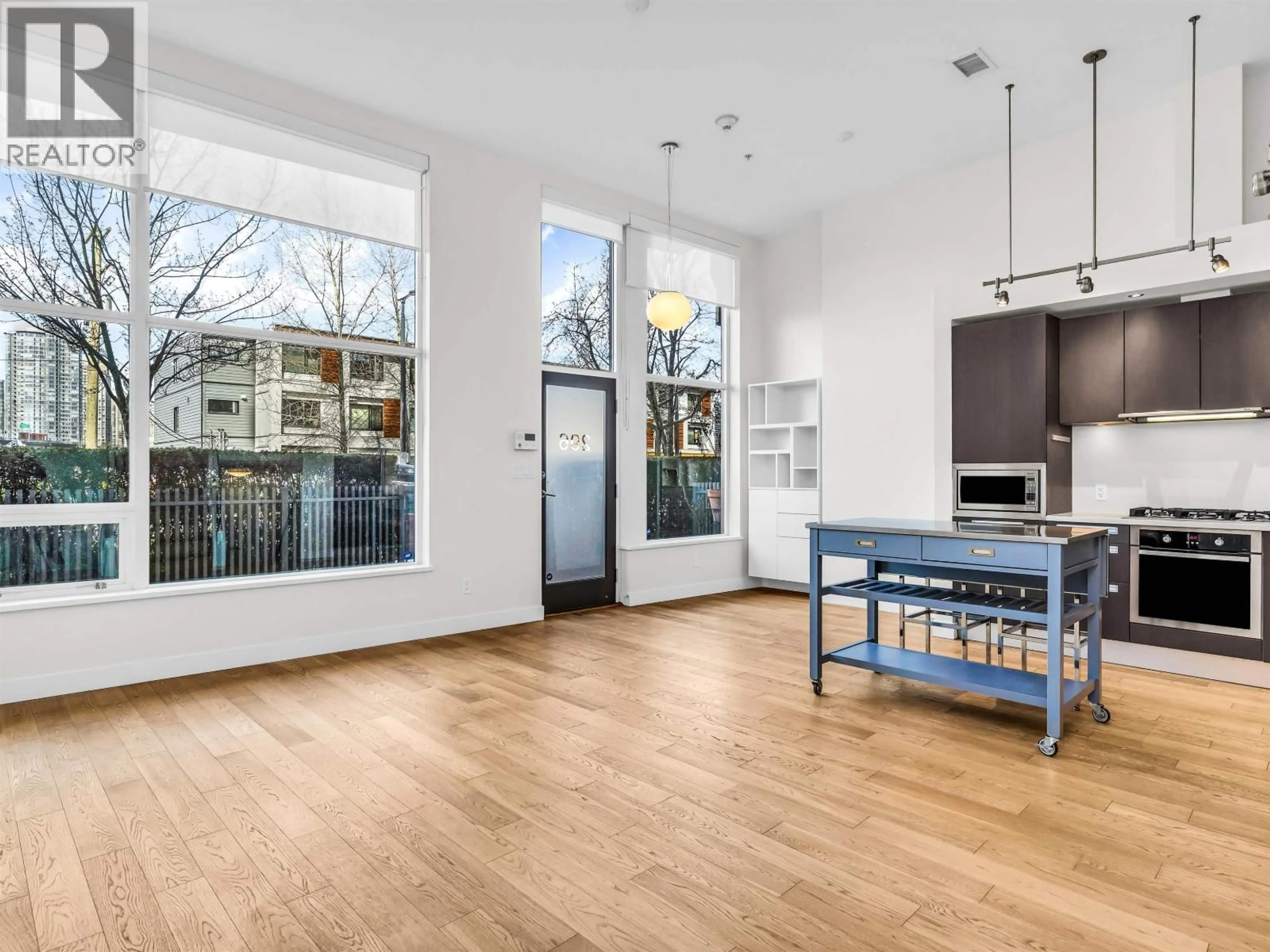 Open concept kitchen, wood/laminate floor for 296 1ST AVENUE, Vancouver British Columbia V5Y3T2