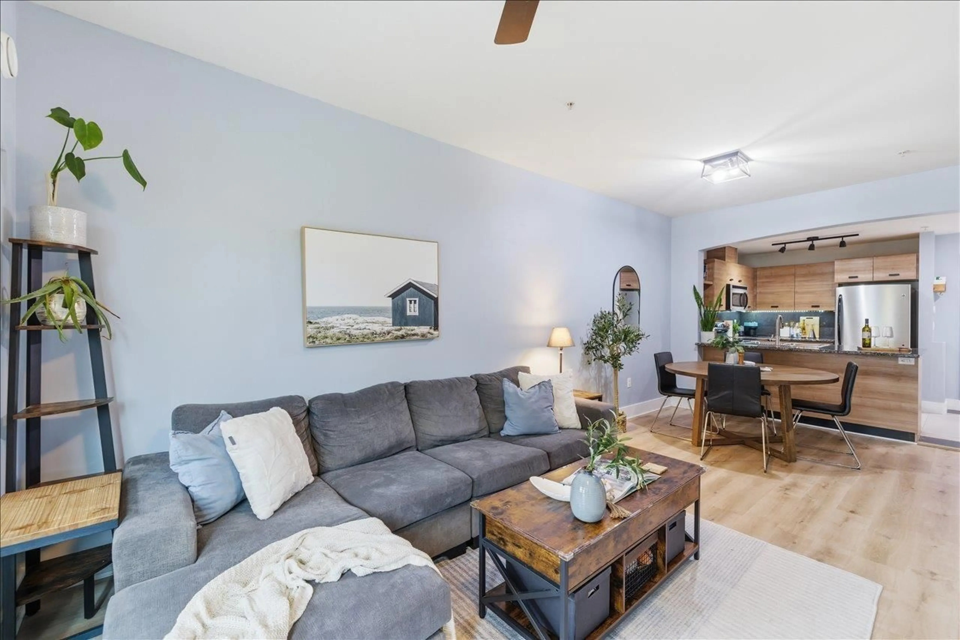 Living room with furniture, wood/laminate floor for 121 - 6688 120 STREET, Surrey British Columbia V3W1T8