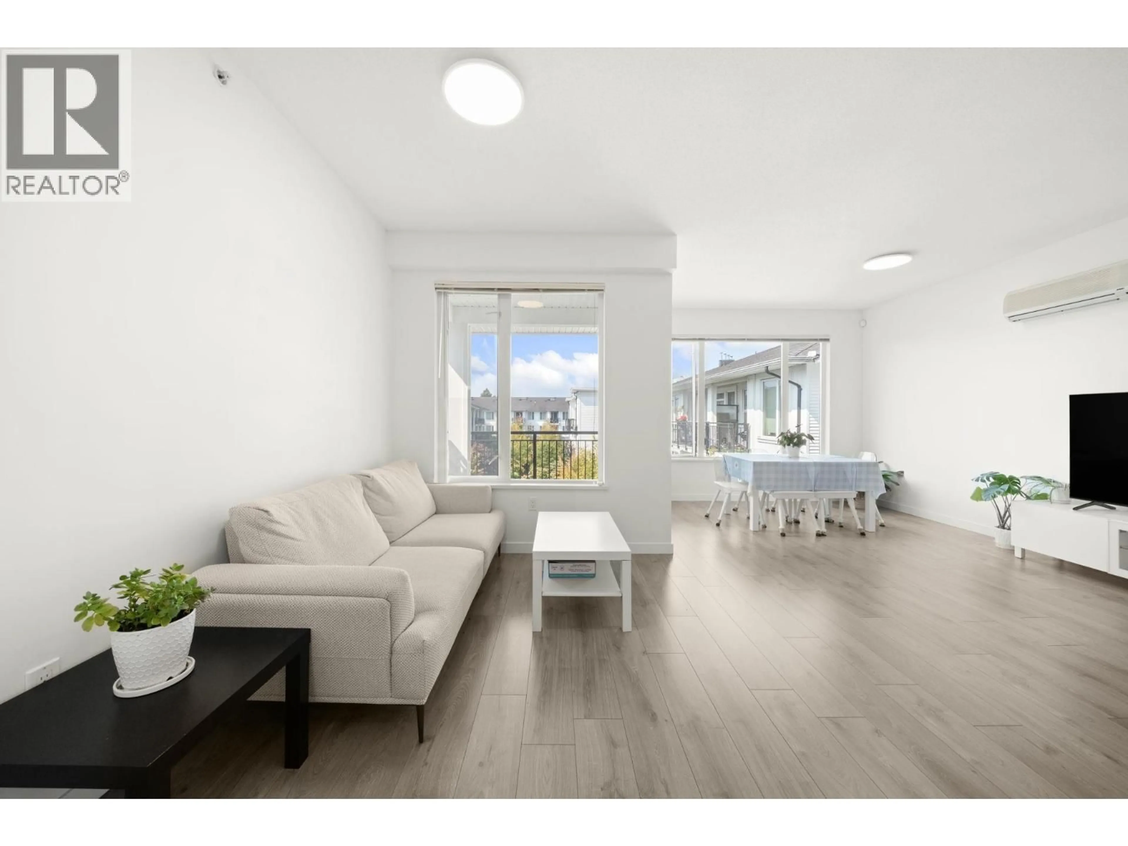 Living room with furniture, unknown for 438 - 9388 MCKIM WAY, Richmond British Columbia V6X0J7