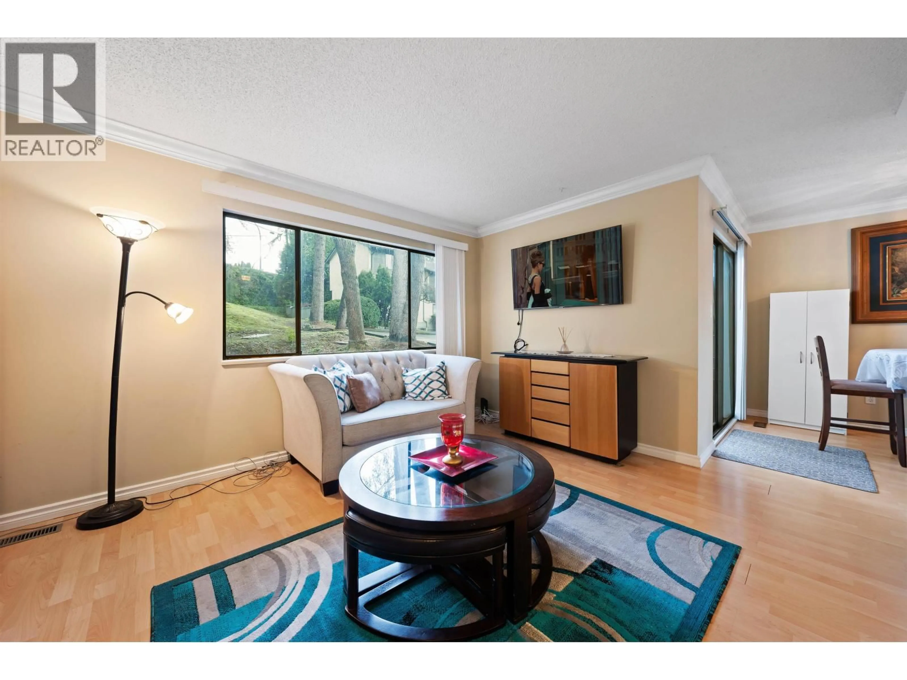 Living room with furniture, wood/laminate floor for 22 - 2880 DACRE AVENUE, Coquitlam British Columbia V3C4H6