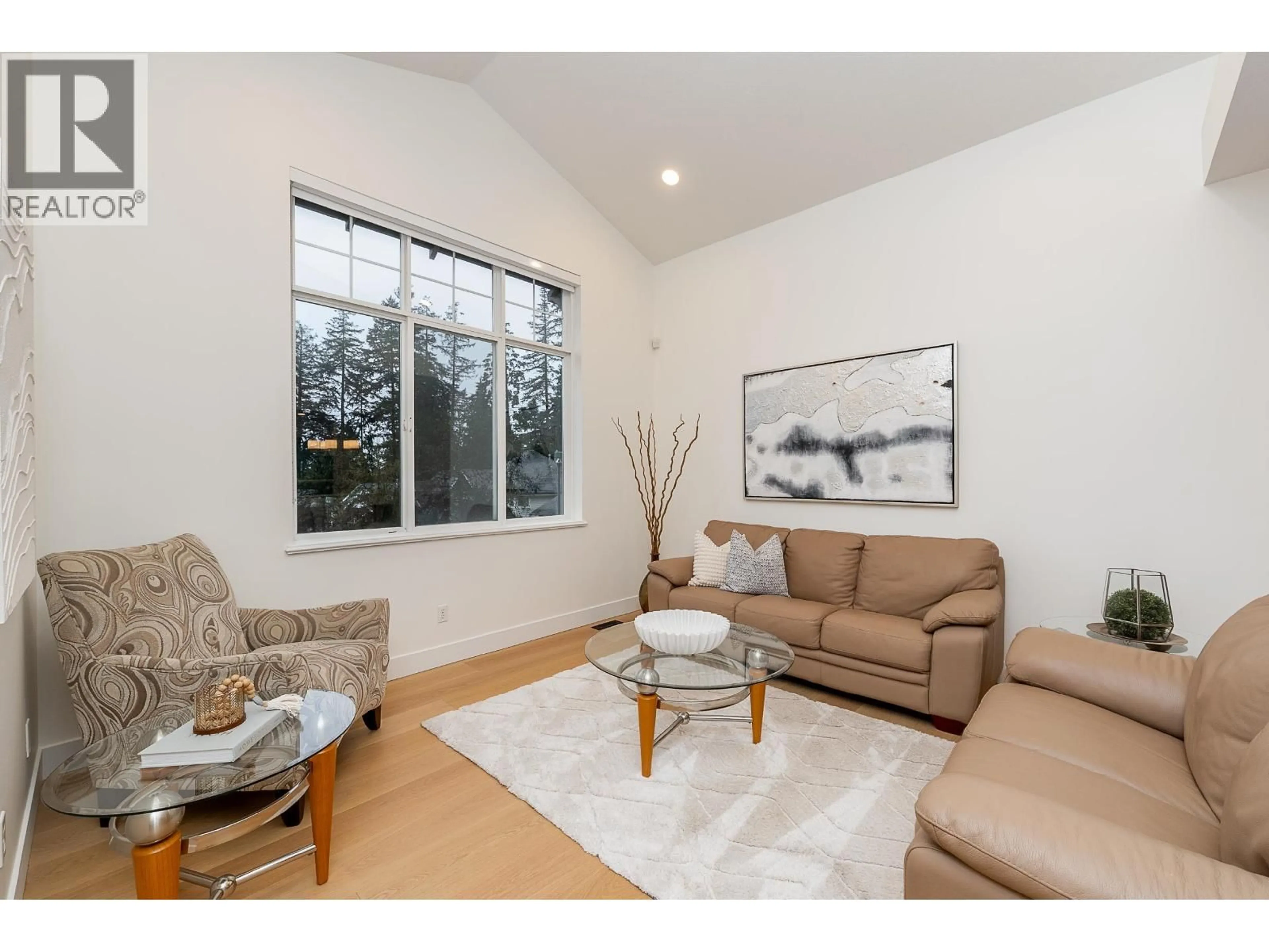 Living room with furniture, wood/laminate floor for 39 HOLLY DRIVE, Port Moody British Columbia V3H5M4