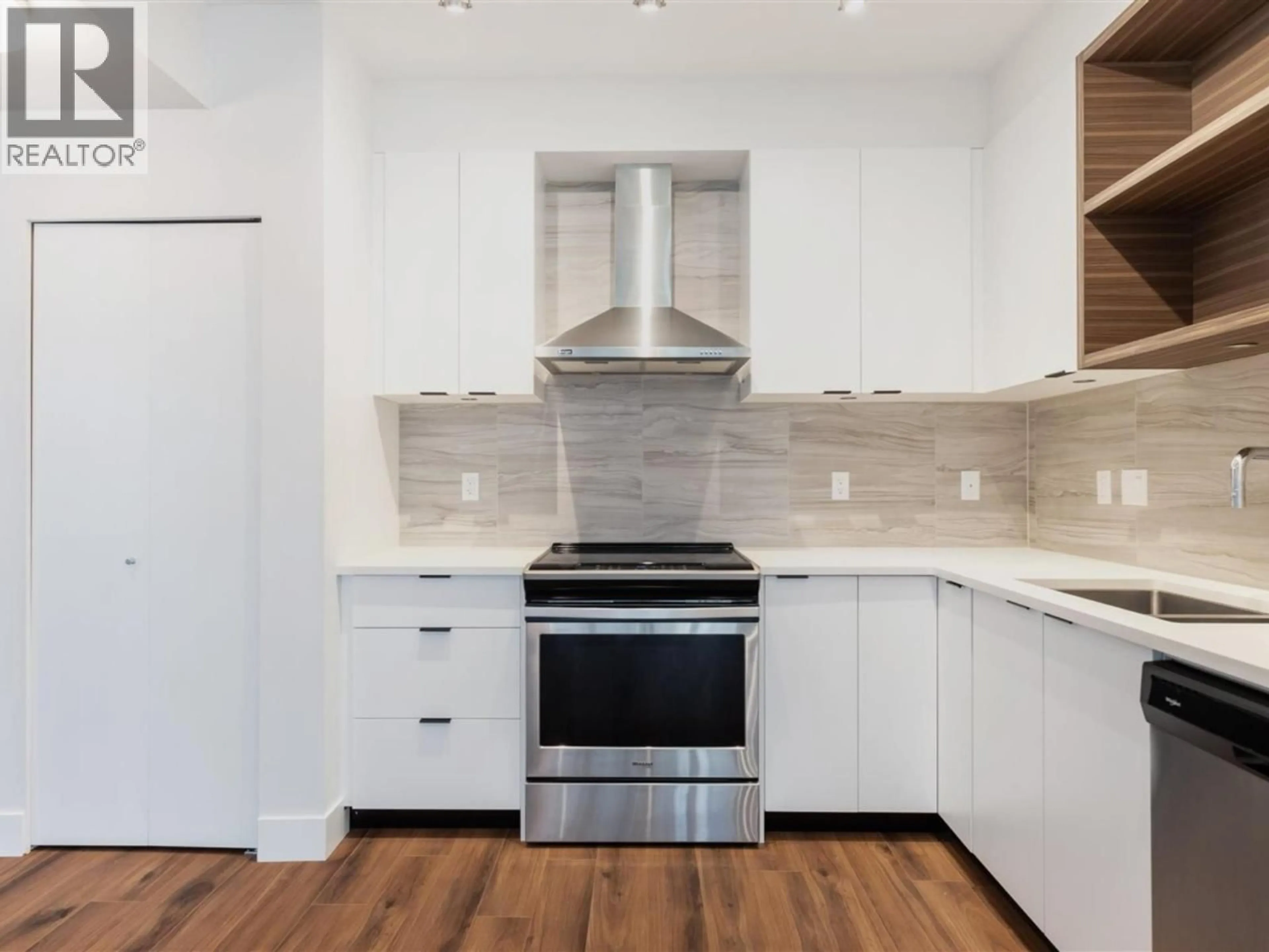 Open concept kitchen, unknown for 240 - 5355 LANE STREET, Burnaby British Columbia V5H0H1