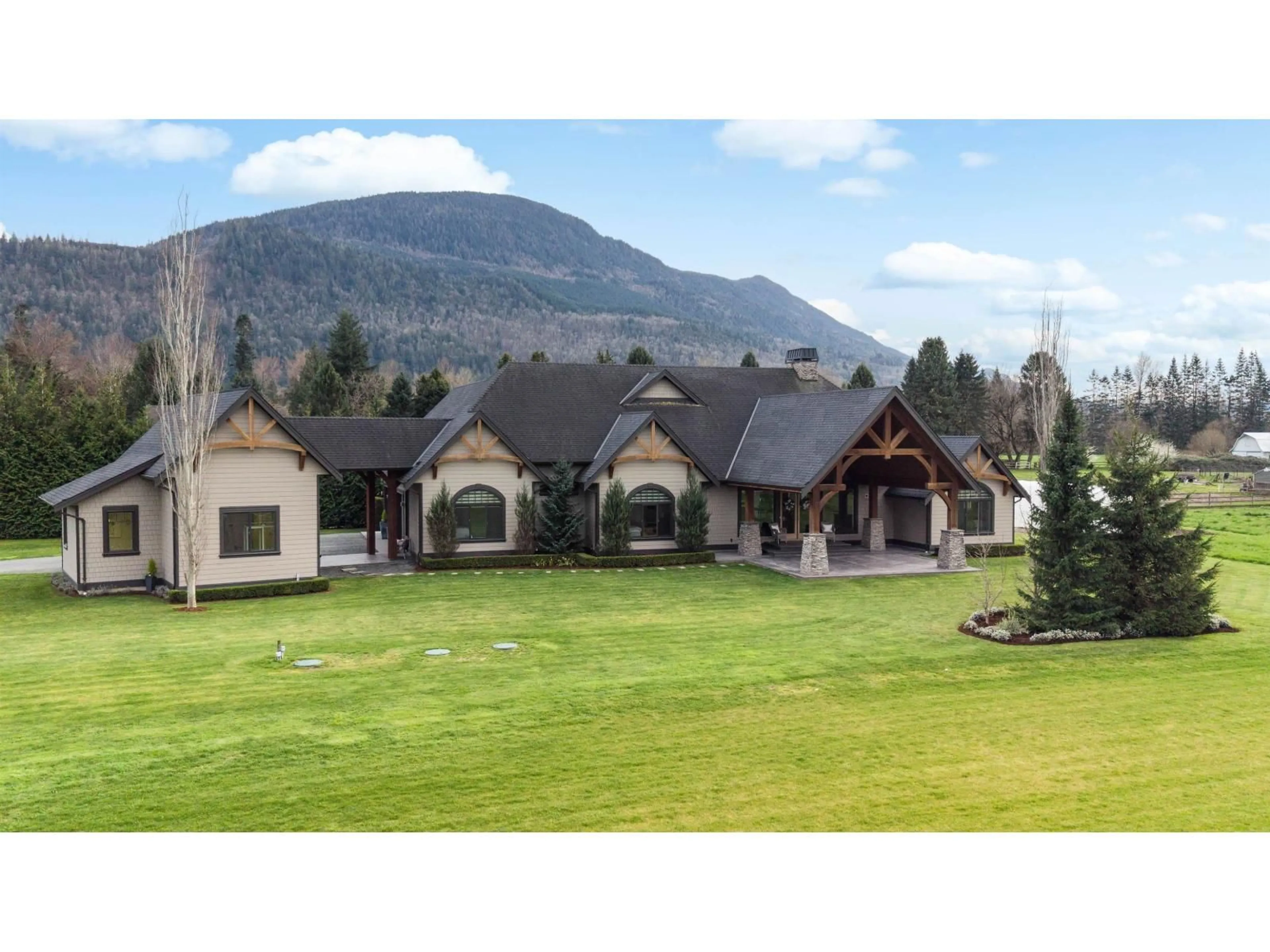 A pic from outside/outdoor area/front of a property/back of a property/a pic from drone, mountain view for 5523 LICKMAN ROAD, Chilliwack British Columbia V2R4B5