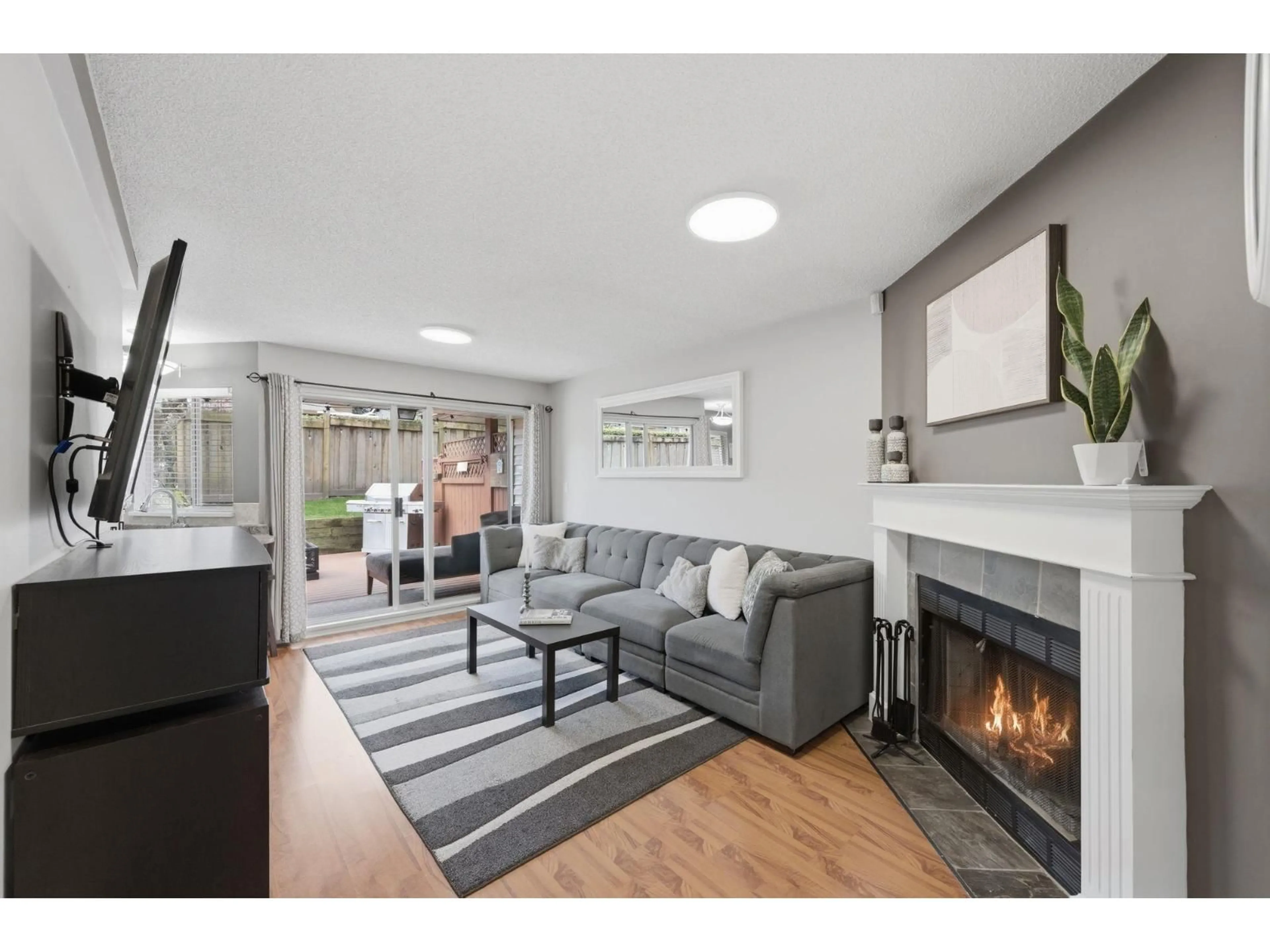 Living room with furniture, wood/laminate floor for 18 - 6940 NICHOLSON ROAD, Delta British Columbia V4E3G5