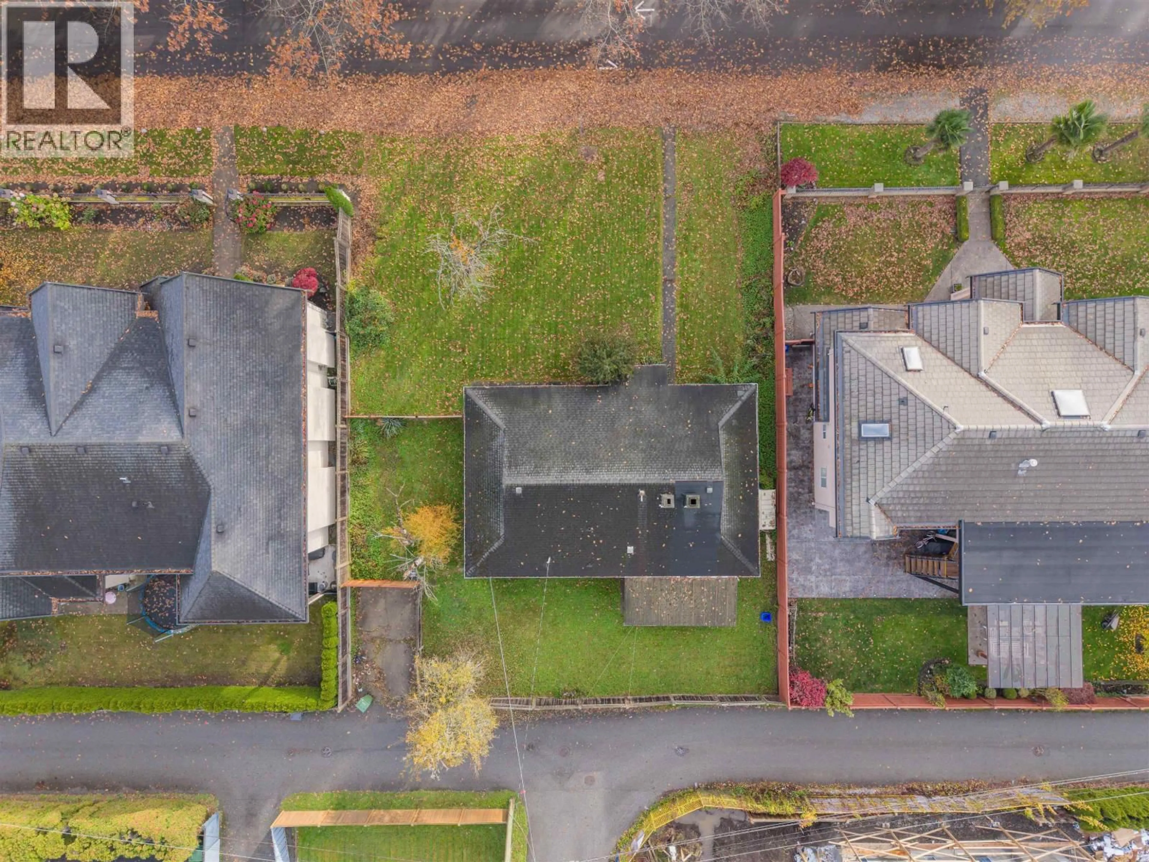 A pic from outside/outdoor area/front of a property/back of a property/a pic from drone, street for 10891 MADDOCKS ROAD, Richmond British Columbia V7A3M9