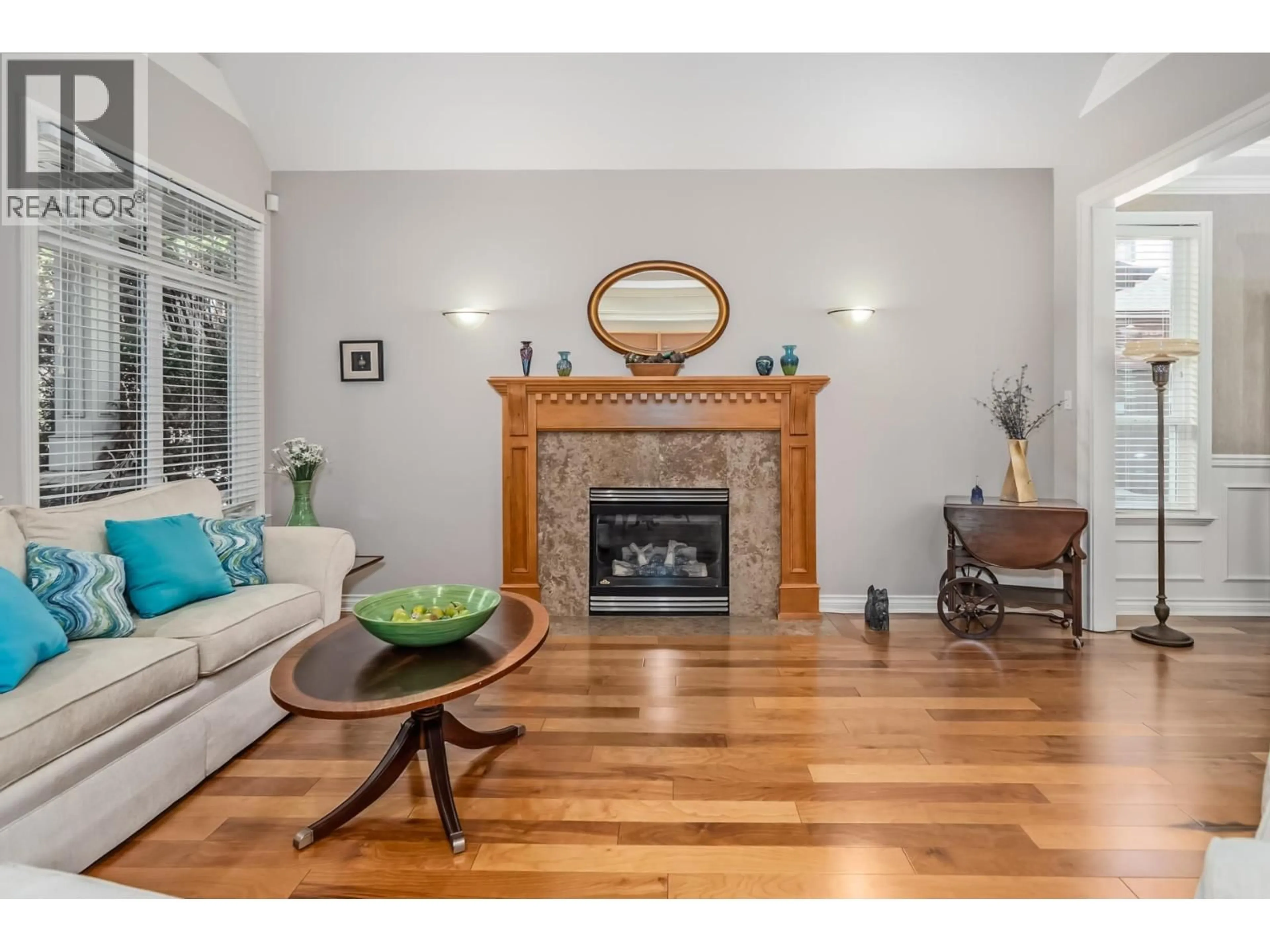 Living room with furniture, wood/laminate floor for 6128 DOVER ROAD, Richmond British Columbia V7C3L1