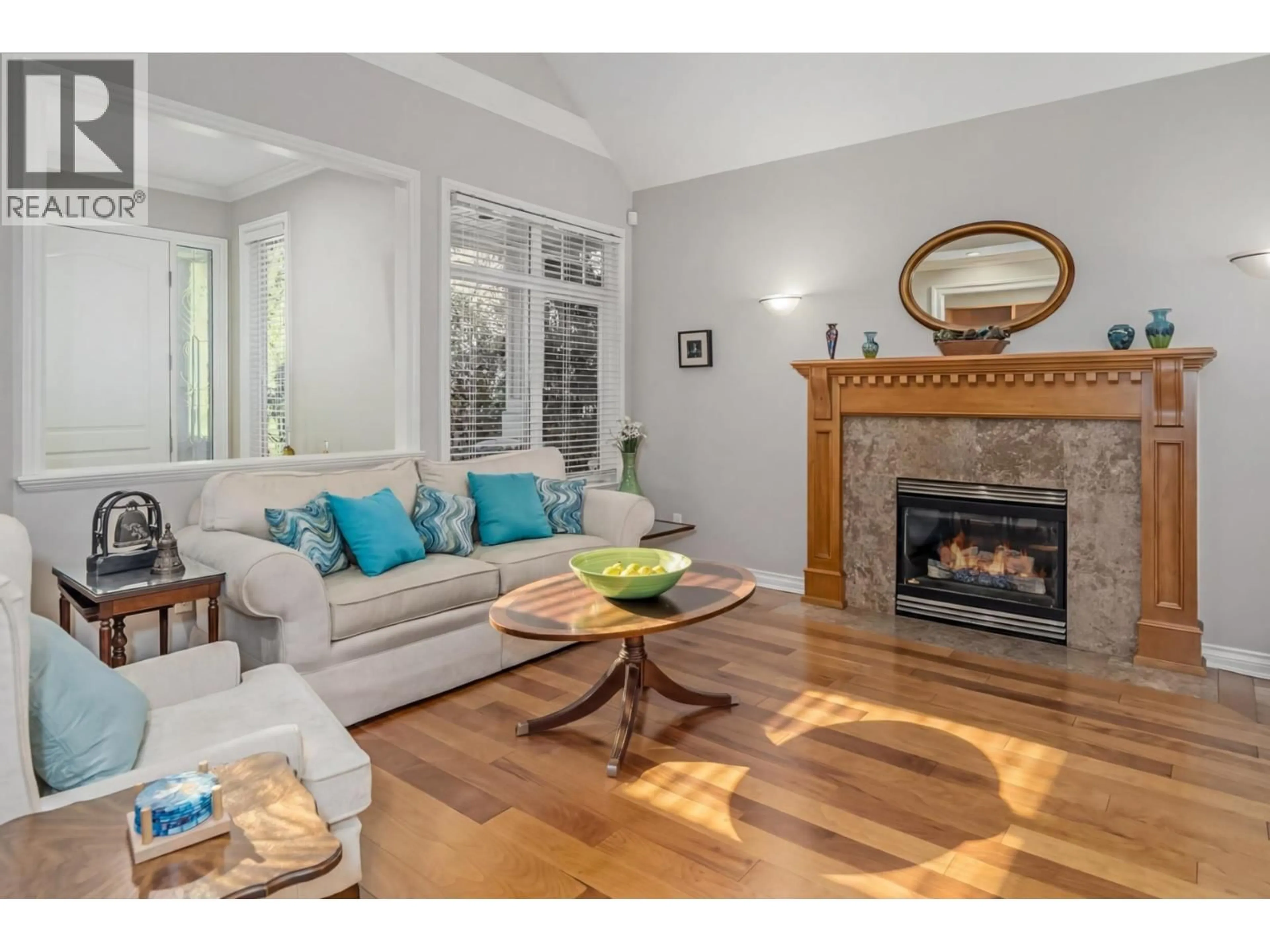 Living room with furniture, wood/laminate floor for 6128 DOVER ROAD, Richmond British Columbia V7C3L1